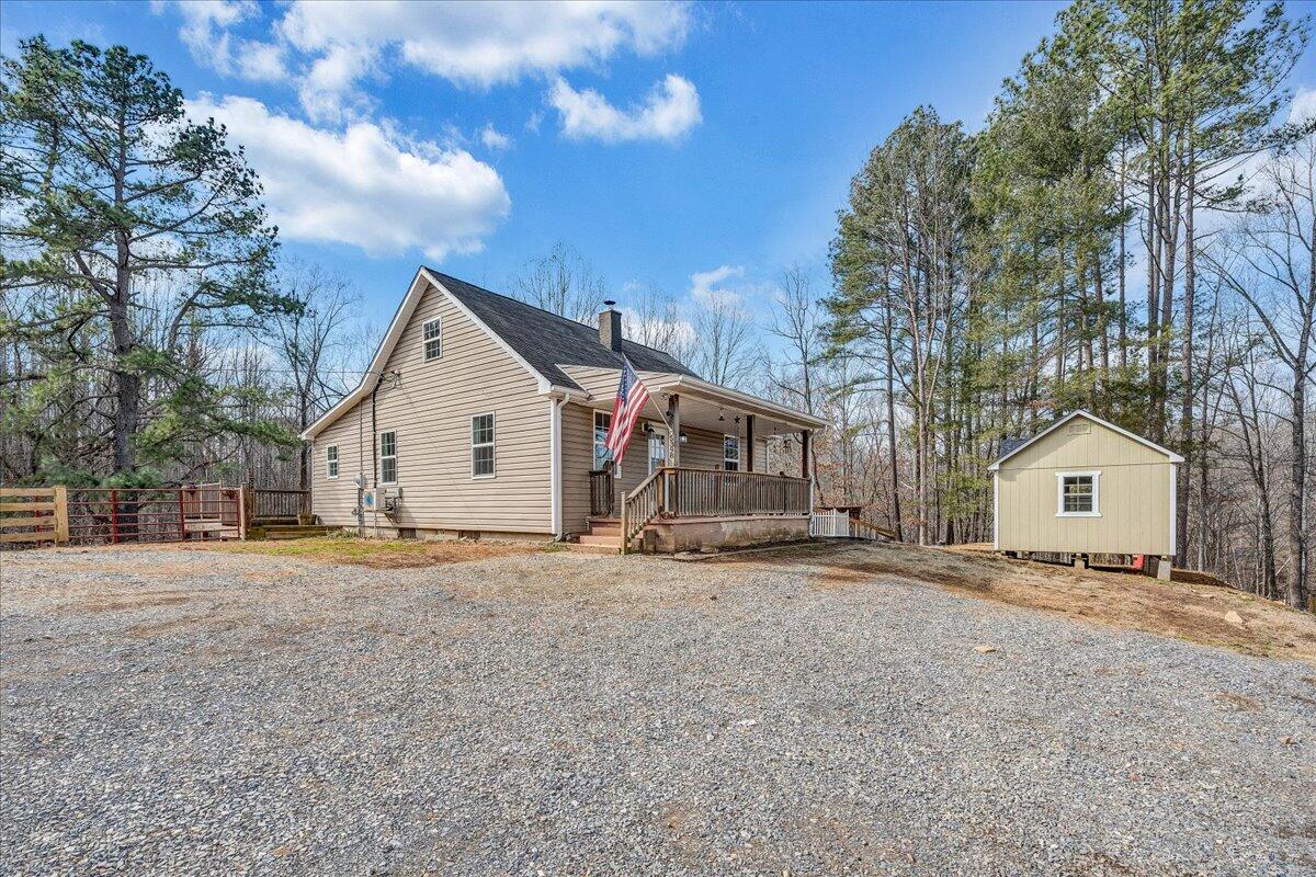 5398 Goodview Road Goodview, VA 24095 - Photo 34 of 59 a view of a house with a yard covered in snow