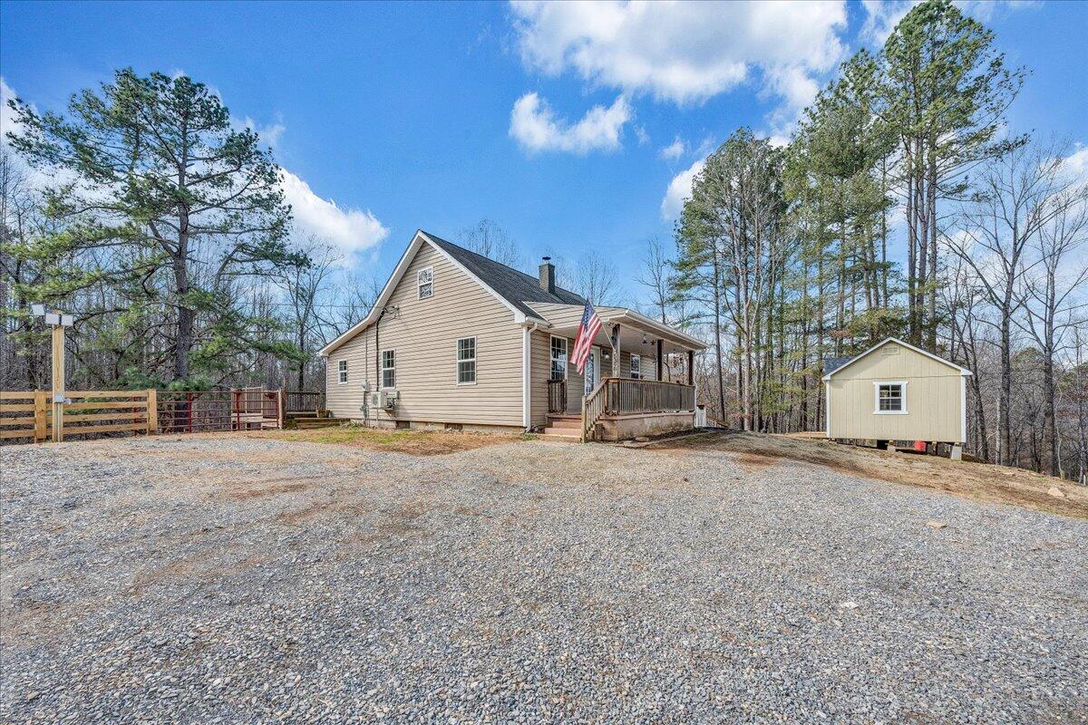 5398 Goodview Road Goodview, VA 24095 - Photo 36 of 59 a view of a house with a yard and garage