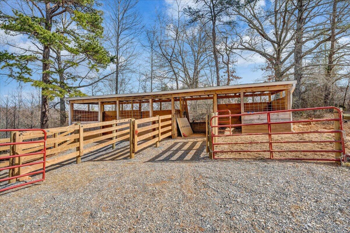5398 Goodview Road Goodview, VA 24095 - Photo 42 of 59 a view of outdoor space with deck and white fence