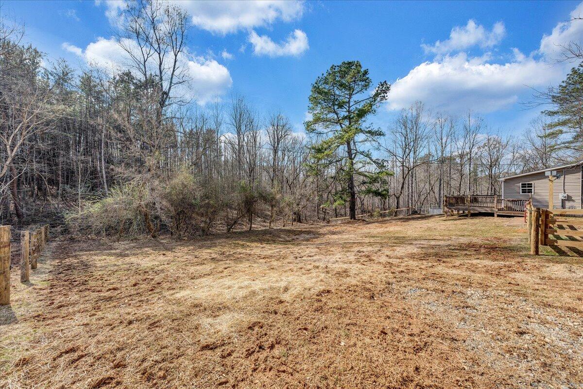 5398 Goodview Road Goodview, VA 24095 - Photo 47 of 59 a view of a yard with wooden fence