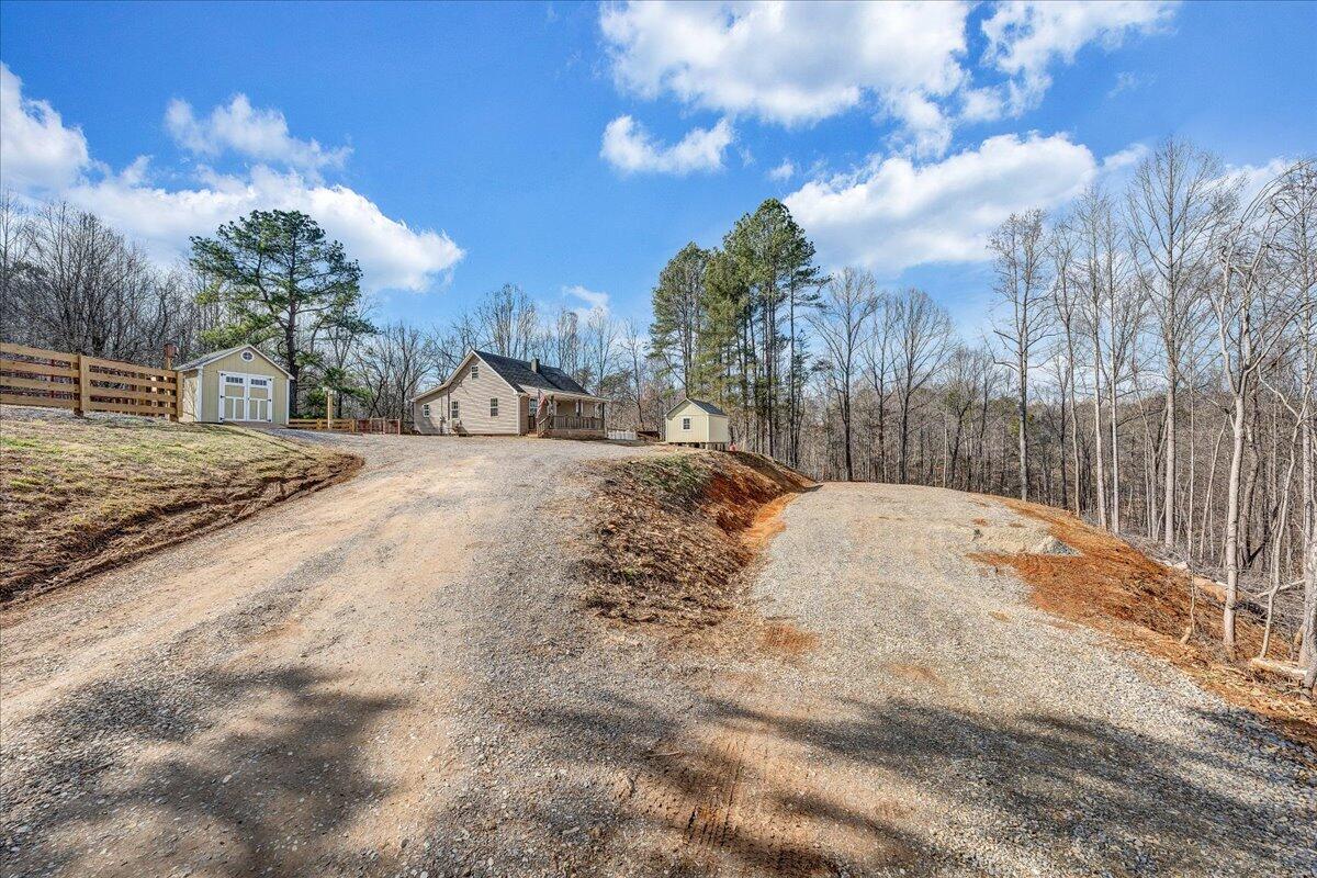 5398 Goodview Road Goodview, VA 24095 - Photo 48 of 59 a view of a yard with snow on the road