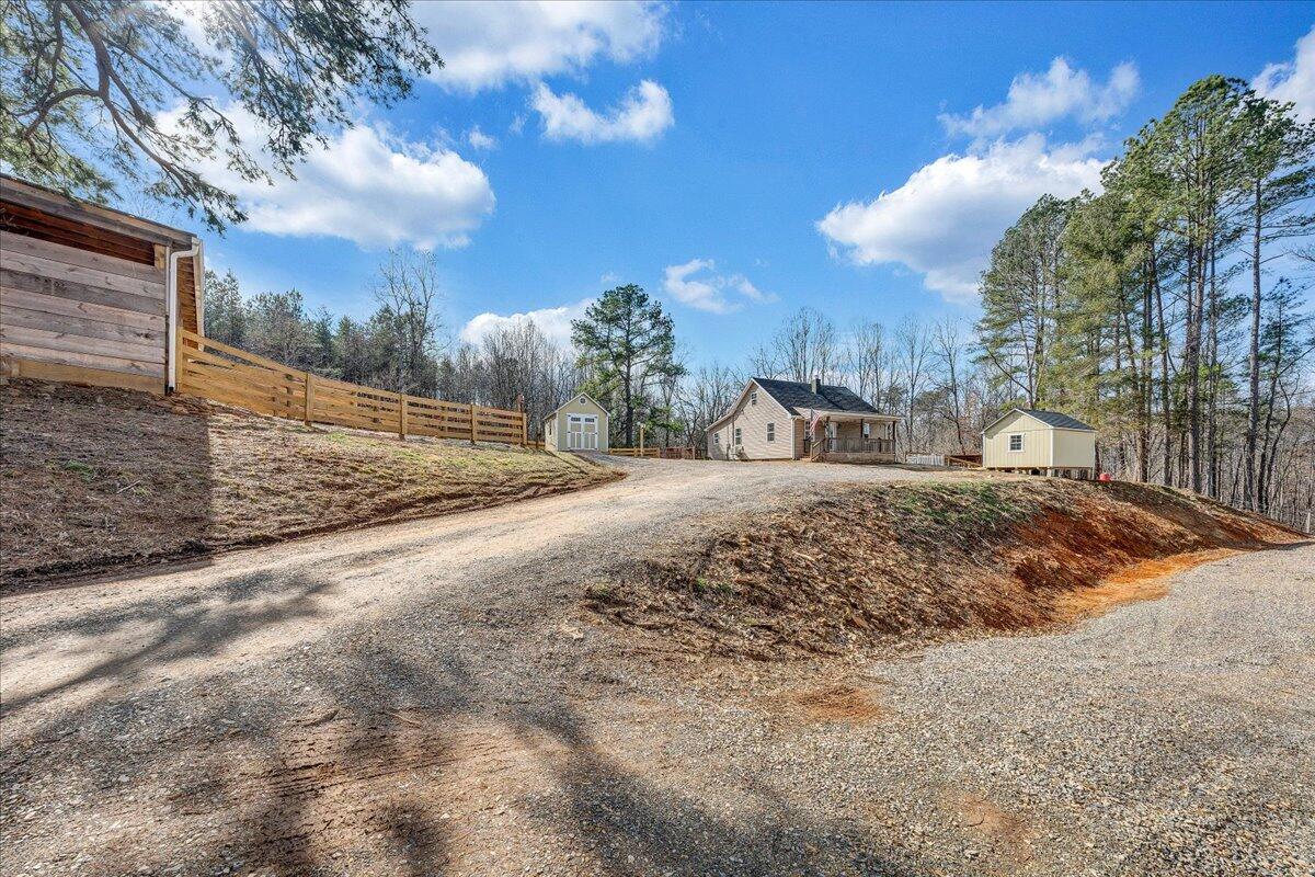 5398 Goodview Road Goodview, VA 24095 - Photo 49 of 59 a view of a yard covered with snow in front of house