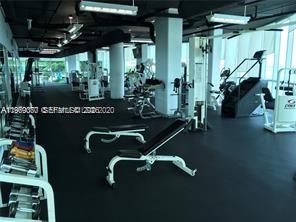 2101 Brickell Avenue, Unit 1807 Miami, FL 33129 - Photo 23 of 39 Huge fitness center with views of the bay!
