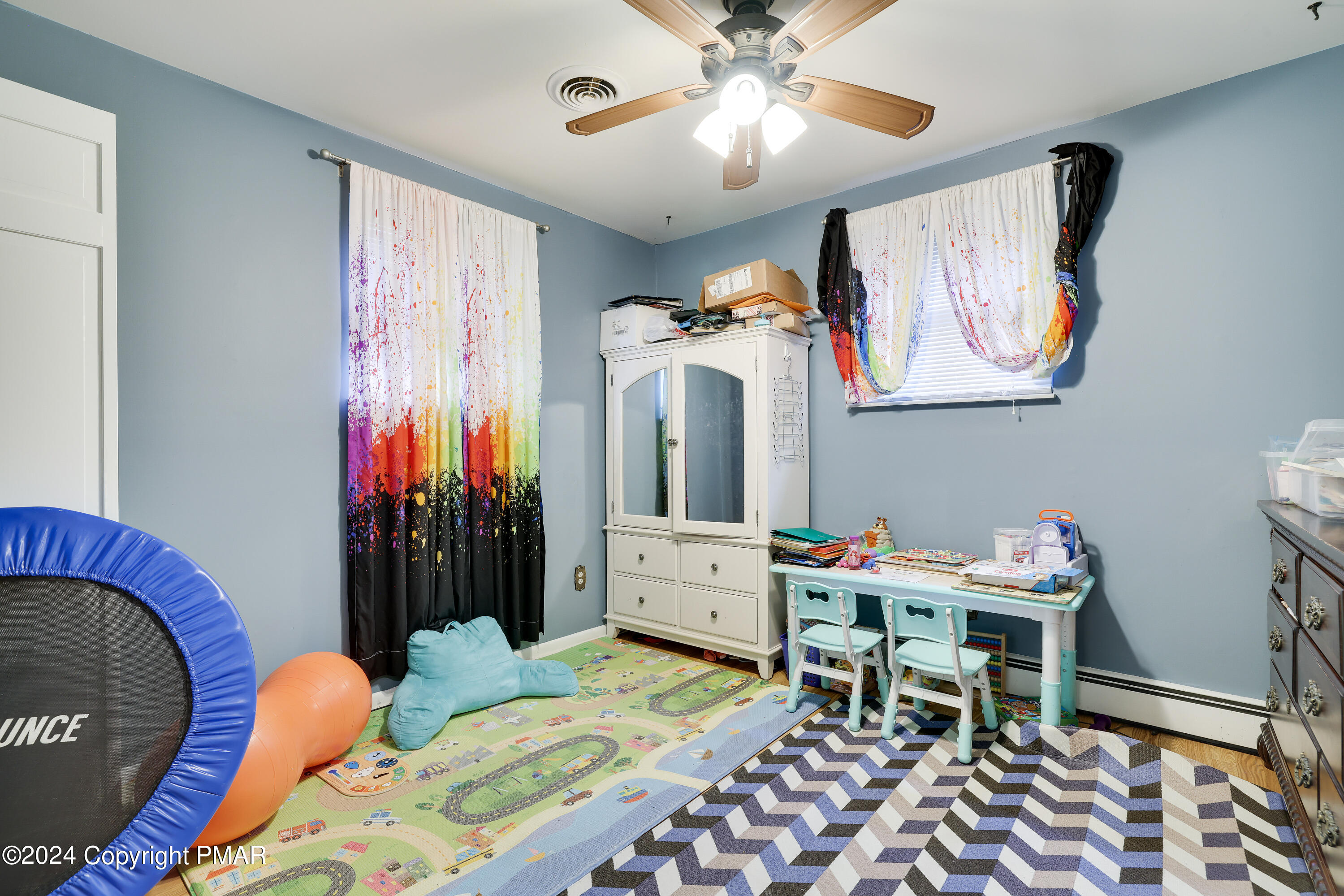 9 Jewel Street Roseto, PA 18013 - Photo 12 of 23 a dining room with furniture and chandelier