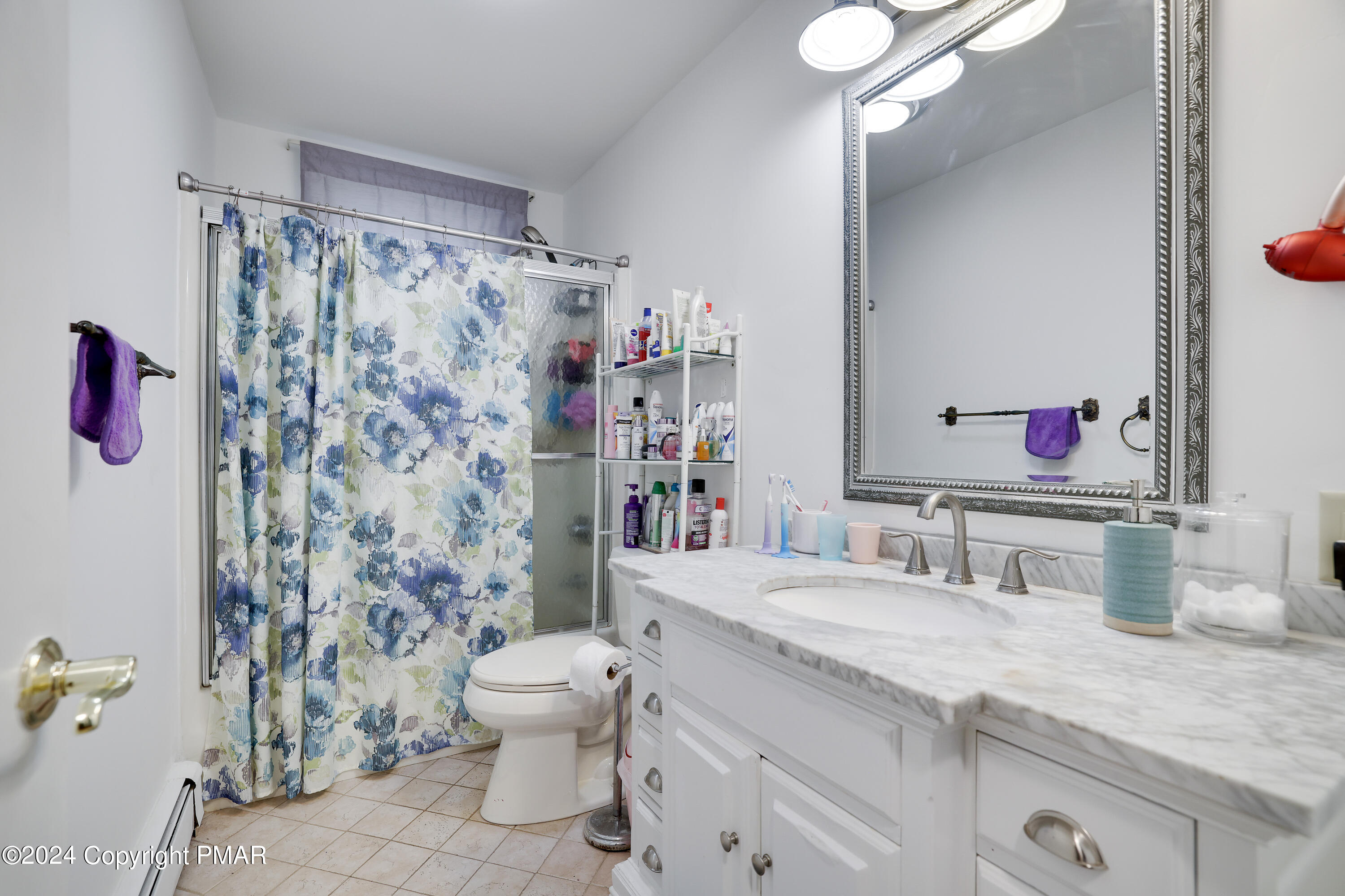 9 Jewel Street Roseto, PA 18013 - Photo 15 of 23 a bathroom with a granite countertop sink mirror vanity and toilet