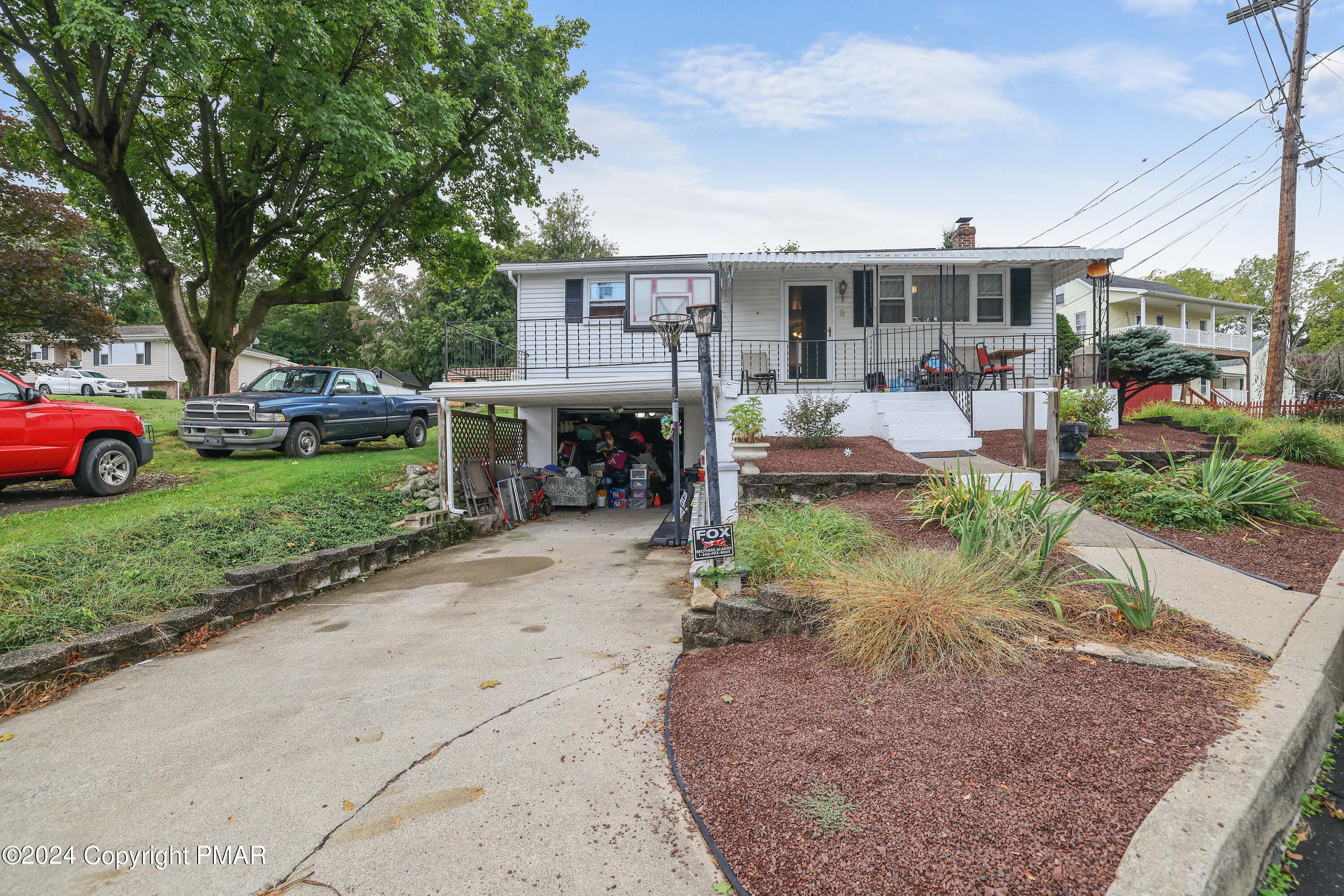 9 Jewel Street Roseto, PA 18013 - Photo 23 of 23 a view of a house with garden and sitting area