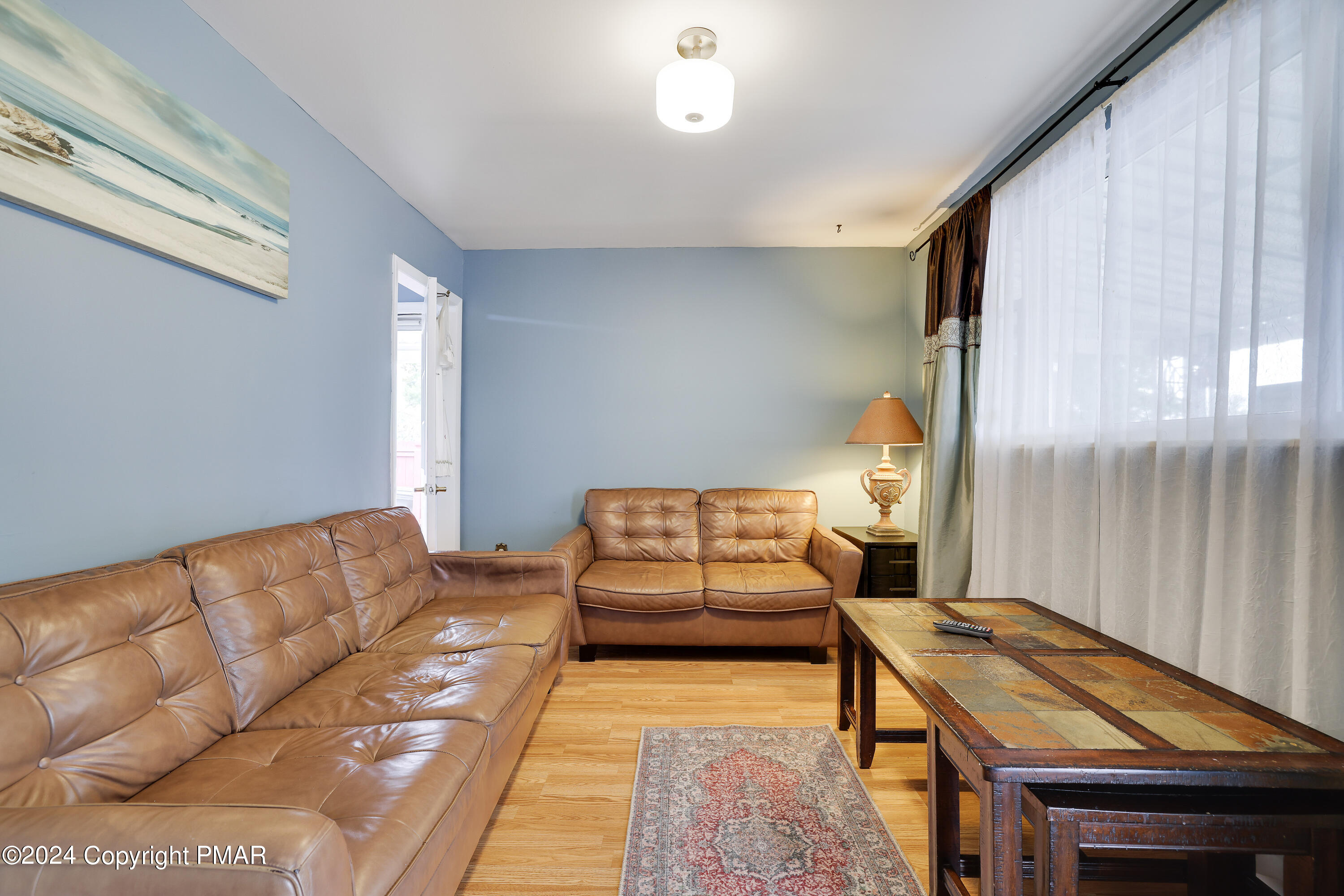 9 Jewel Street Roseto, PA 18013 - Photo 3 of 23 a living room with furniture and a couch