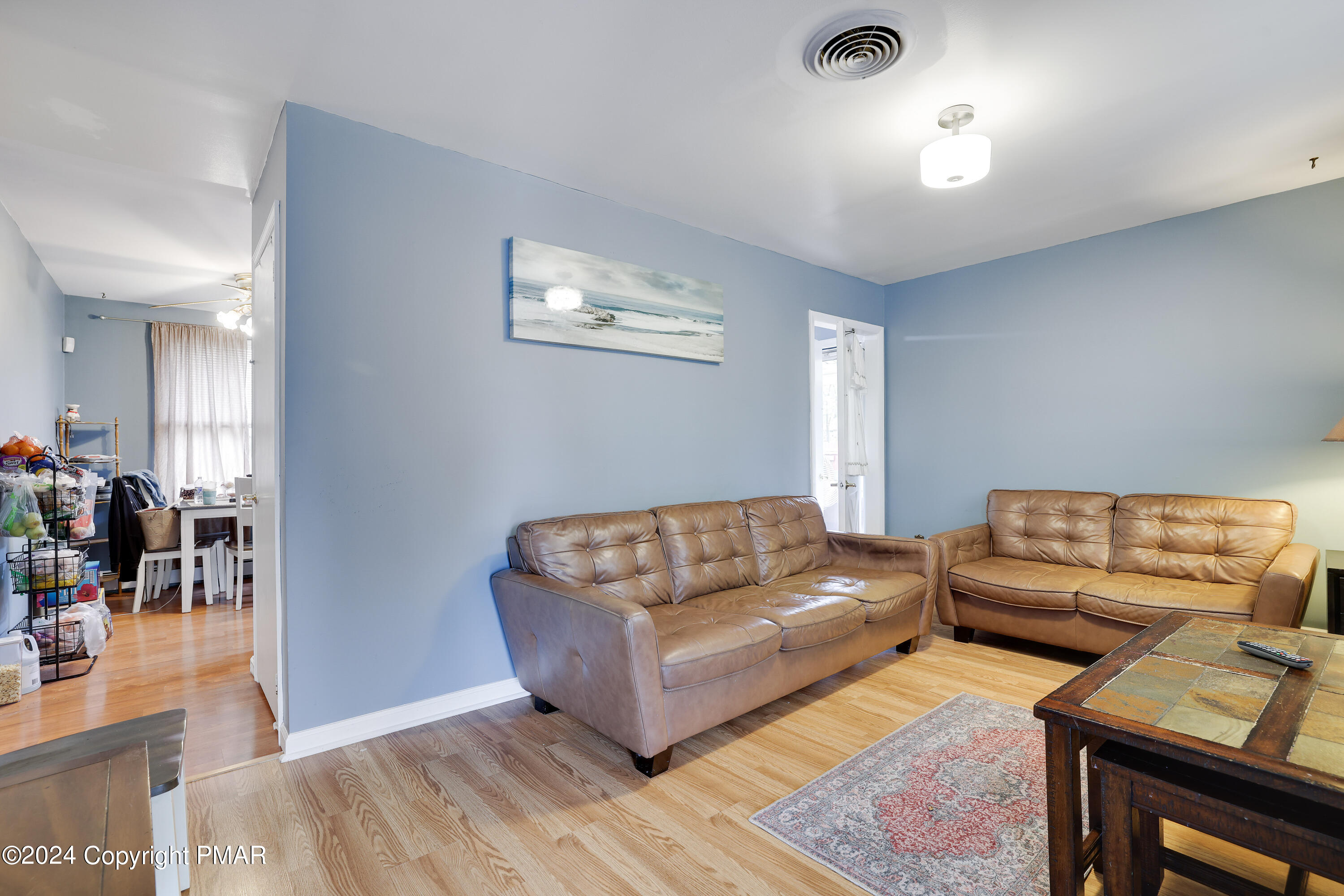 9 Jewel Street Roseto, PA 18013 - Photo 4 of 23 a living room with furniture and a flat screen tv