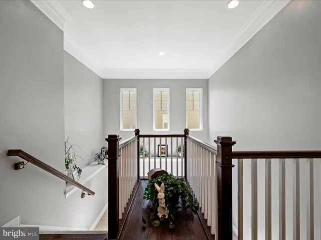 a bedroom with double bed and a couch