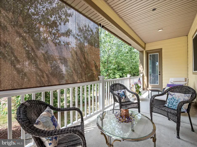 an aerial view of a house with swimming pool
