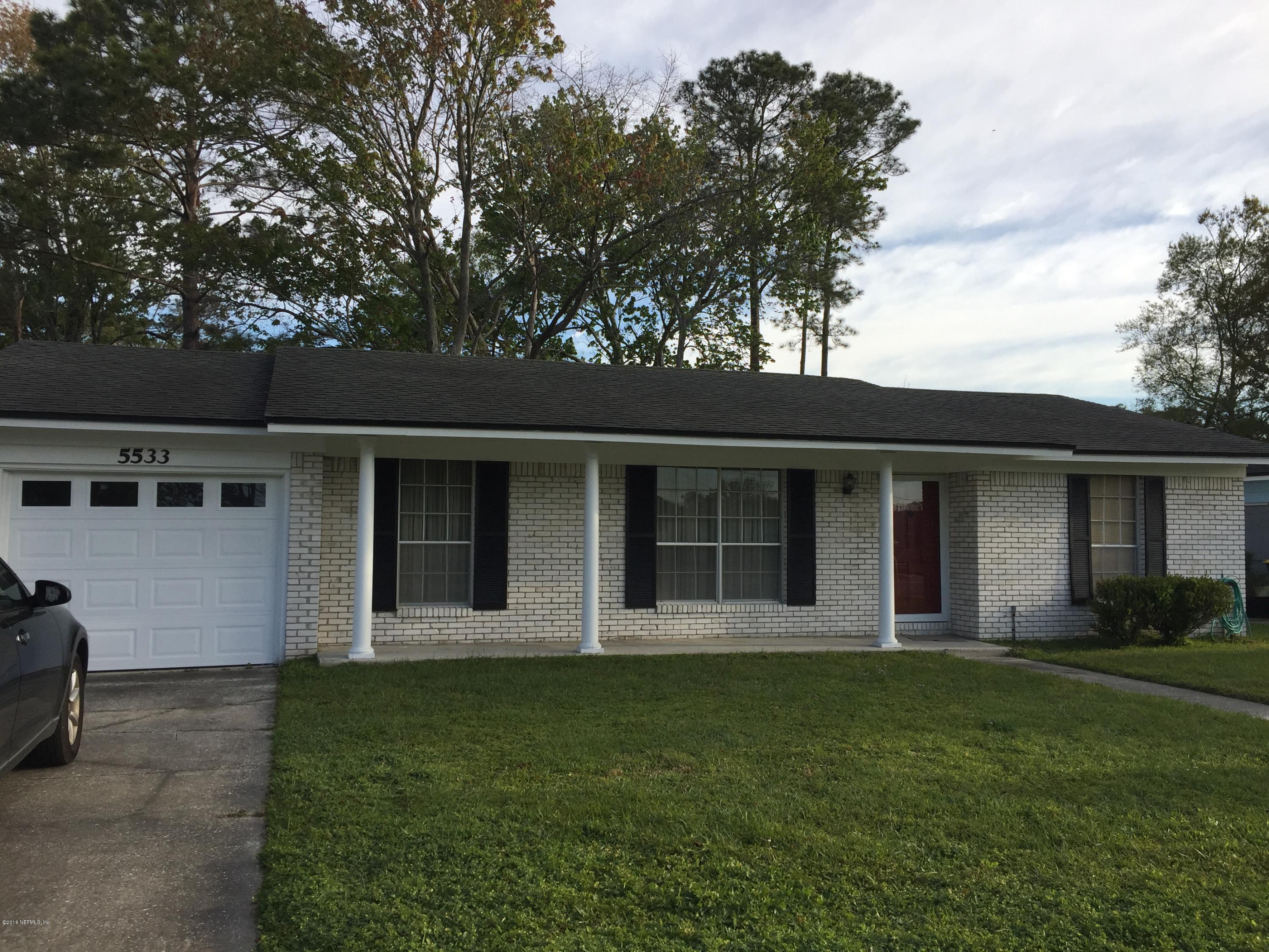 5533 Kennerly Road Jacksonville, FL 32207 - Photo 1 of 3 a house view with a garden space