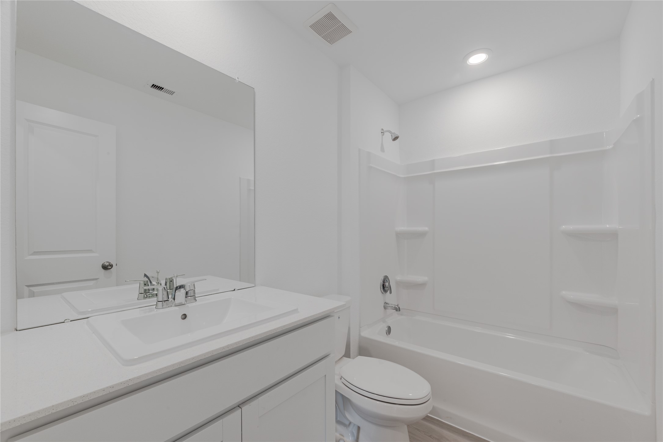 18023 Trepito Avenue New Caney, TX 77357 - Photo 16 of 20 a bathroom with a sink toilet and shower
