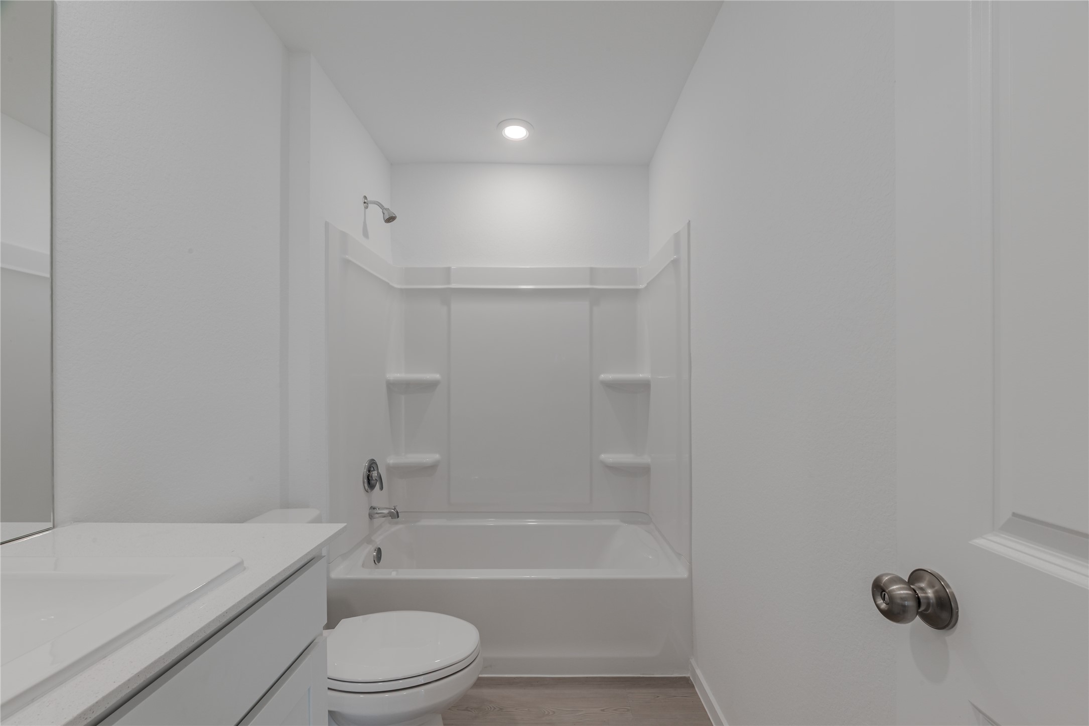 18023 Trepito Avenue New Caney, TX 77357 - Photo 17 of 20 a bathroom with a toilet a sink and bathtub