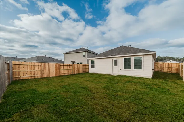 a house view with a garden space