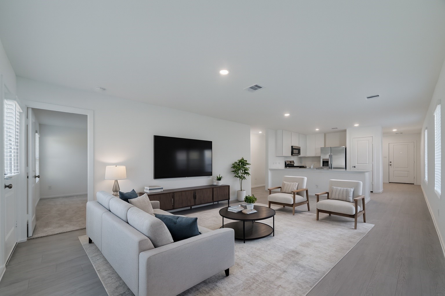 18023 Trepito Avenue New Caney, TX 77357 - Photo 8 of 20 a living room with furniture and a flat screen tv