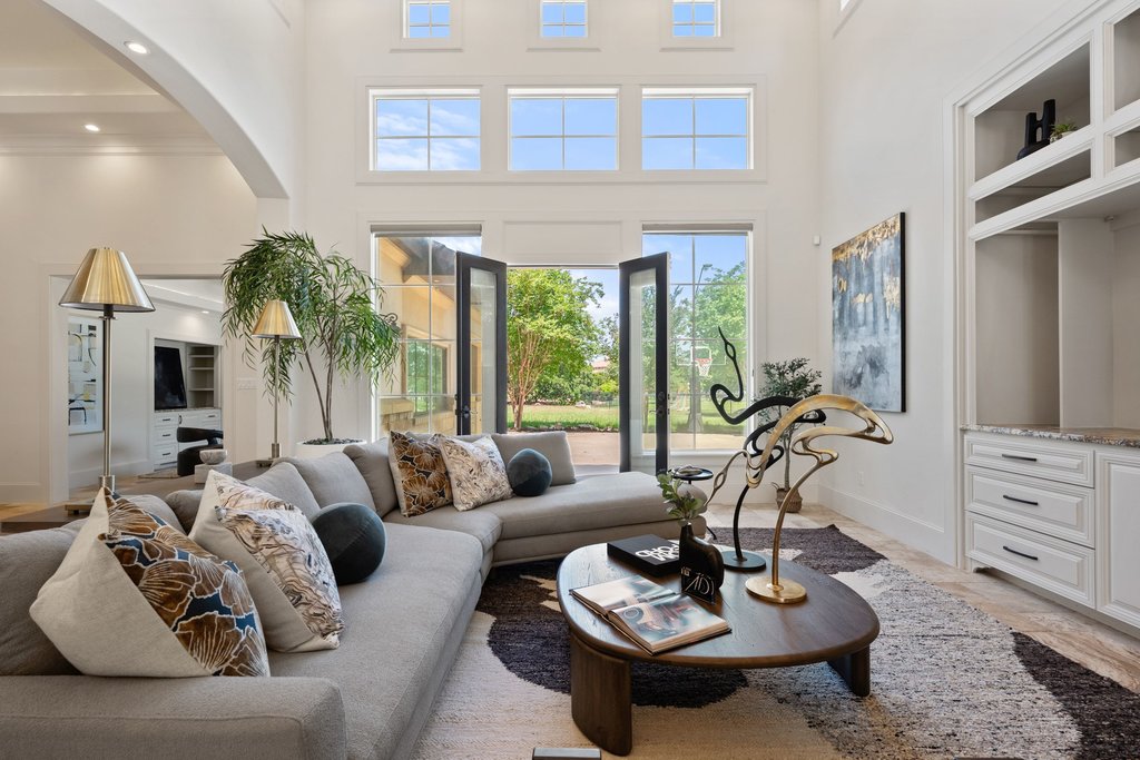 102 Long Point Cove Georgetown, TX 78628 - Photo 14 of 36 a living room with furniture fireplace and a large window
