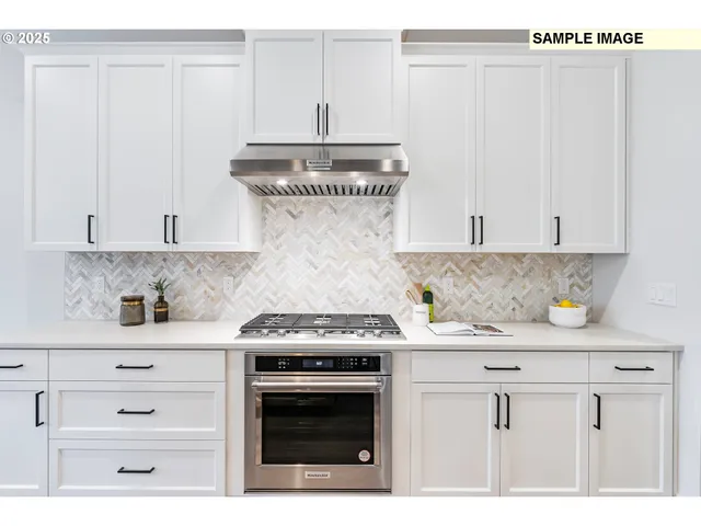 a kitchen with a table chairs stove and microwave