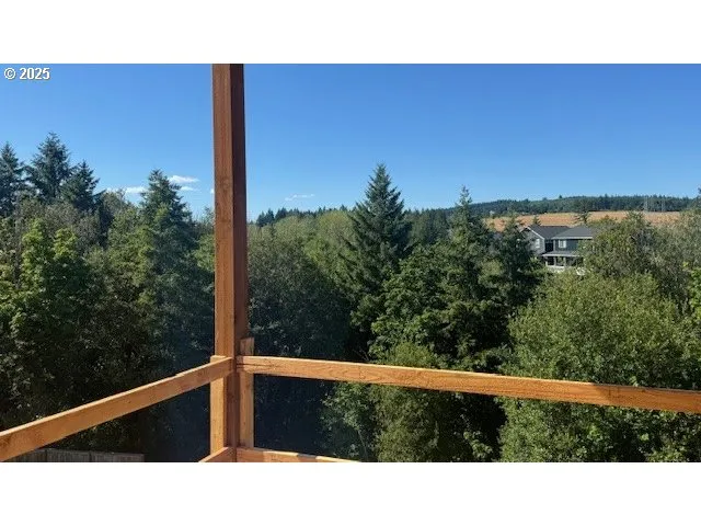 a view of a balcony with an outdoor space