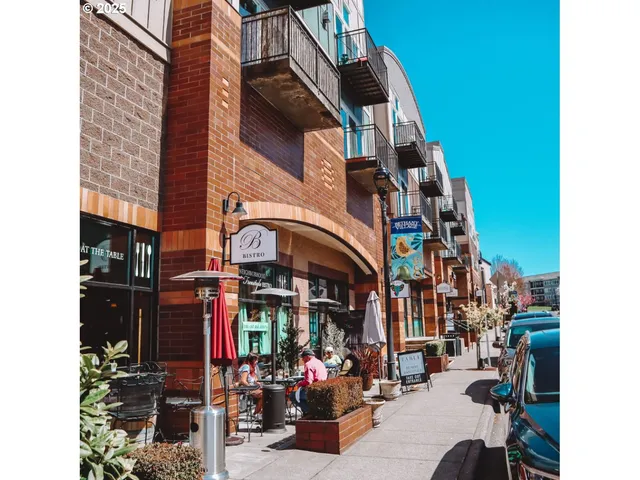a view of a building with sitting area