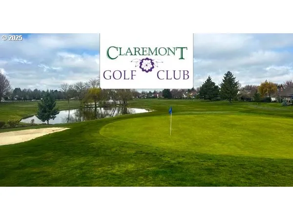 a view of a cafe with sitting area