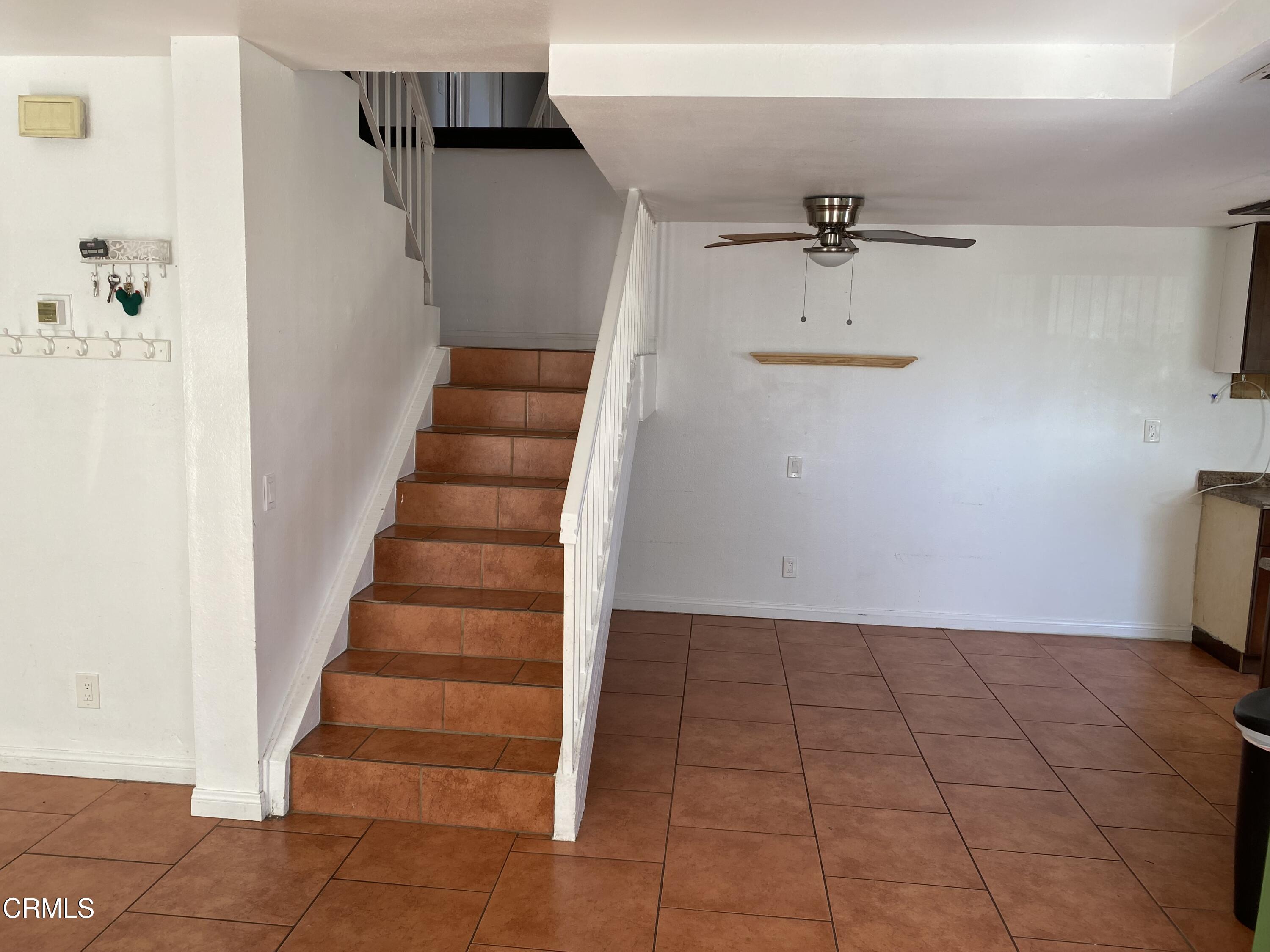 5305 Perkins Road Oxnard, CA 93033 - Photo 11 of 23 a view of an entryway with staircase