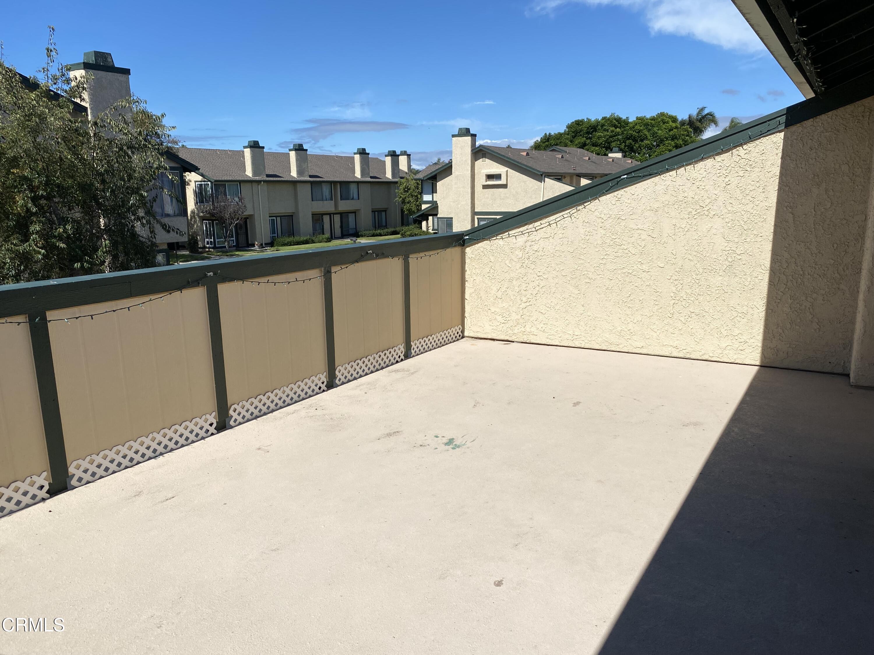 5305 Perkins Road Oxnard, CA 93033 - Photo 18 of 23 a view of a balcony with wooden floor and city view
