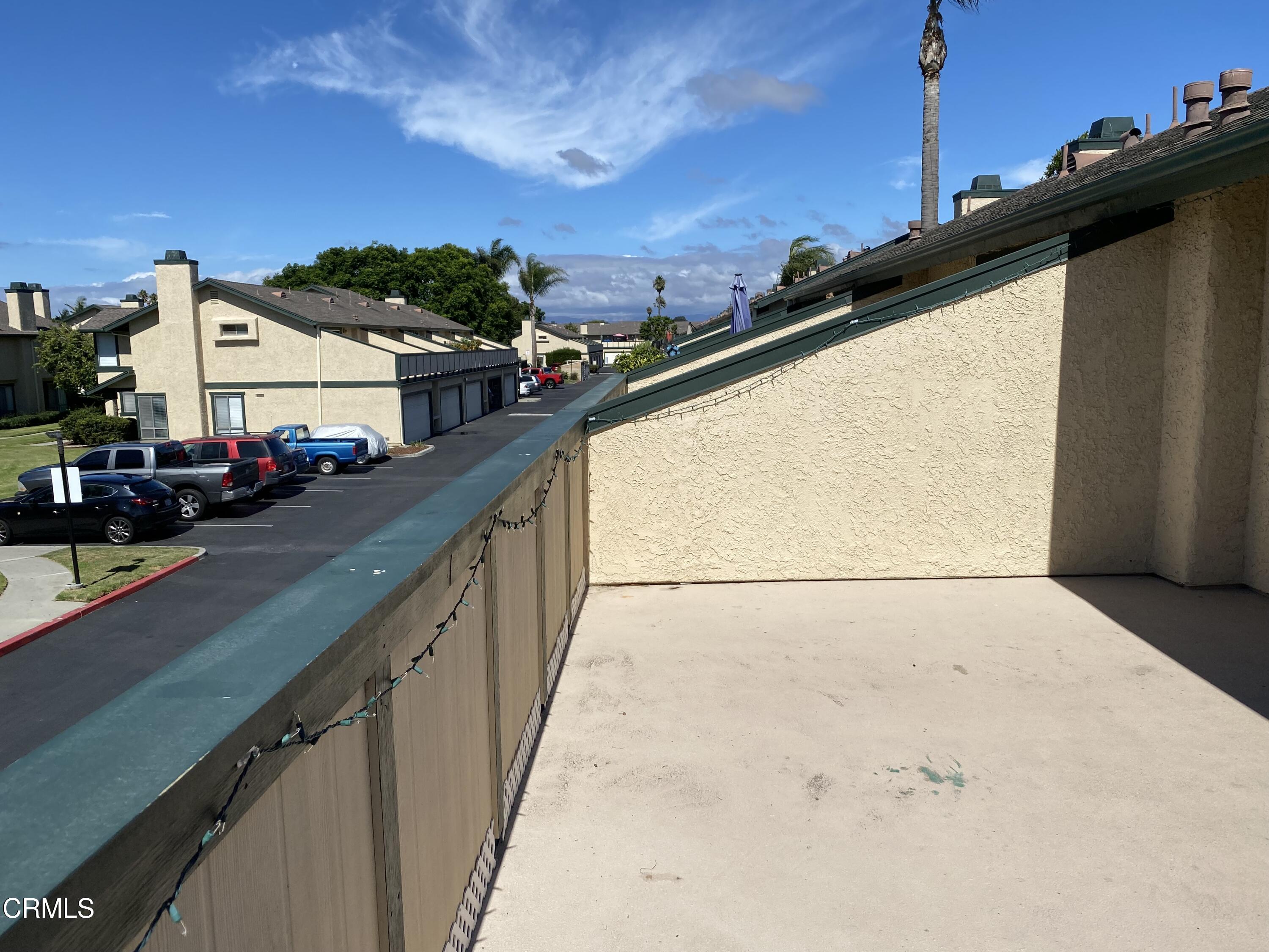 5305 Perkins Road Oxnard, CA 93033 - Photo 19 of 23 a view of balcony with two chairs