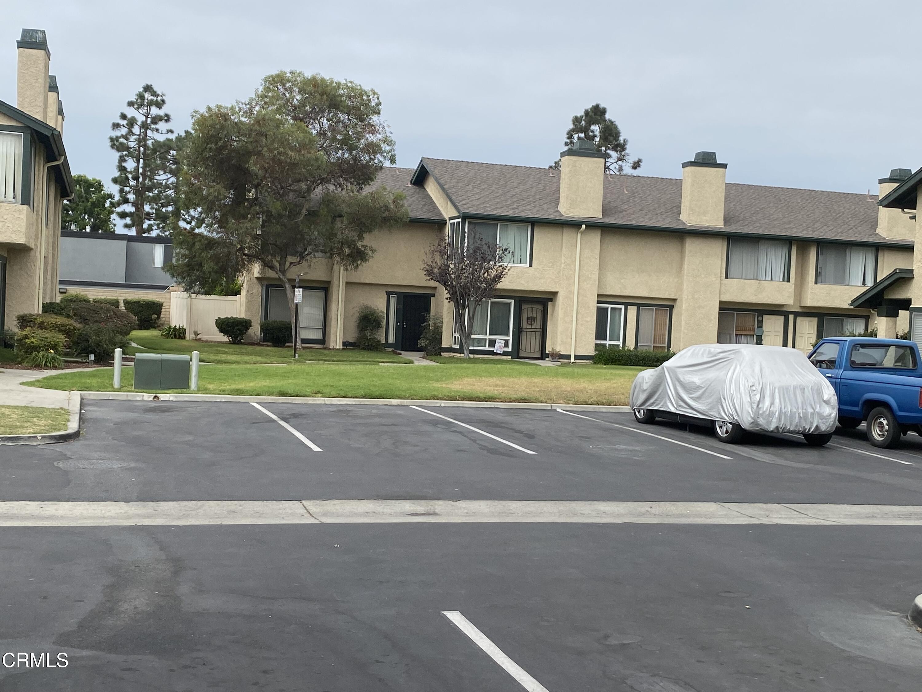 5305 Perkins Road Oxnard, CA 93033 - Photo 3 of 23 a car parked in front of a white building