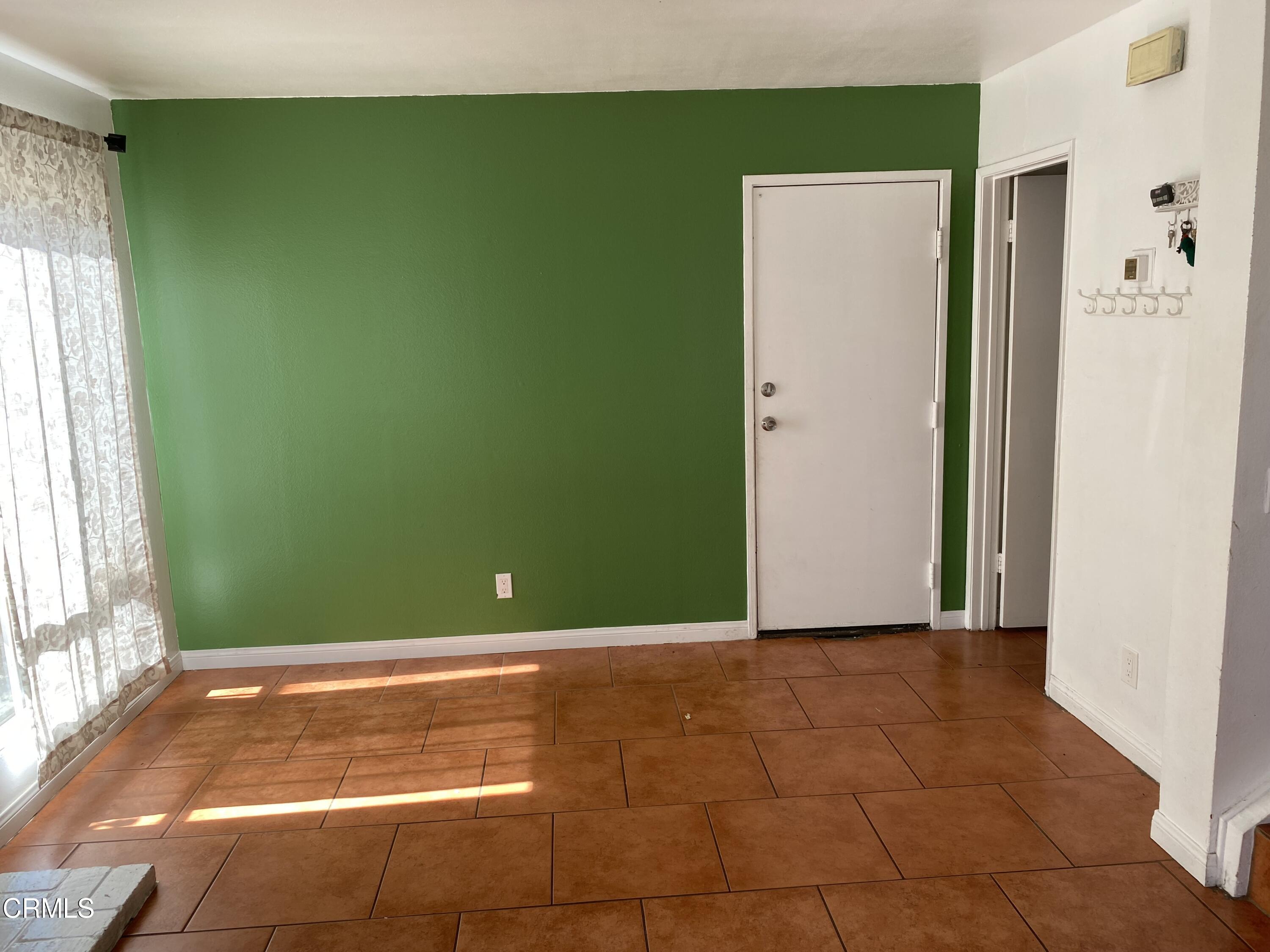 5305 Perkins Road Oxnard, CA 93033 - Photo 10 of 23 a view of a room that has a large window