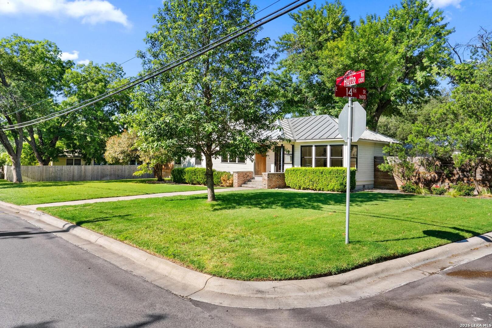 1402 Hutto Road Georgetown, TX 78626 - Photo 2 of 34 a view of a house with a backyard