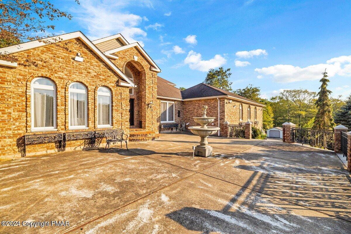 2175 Longview Drive Bushkill, PA 18324 - Photo 41 of 50 a spacious bathroom with a sink and a mirror