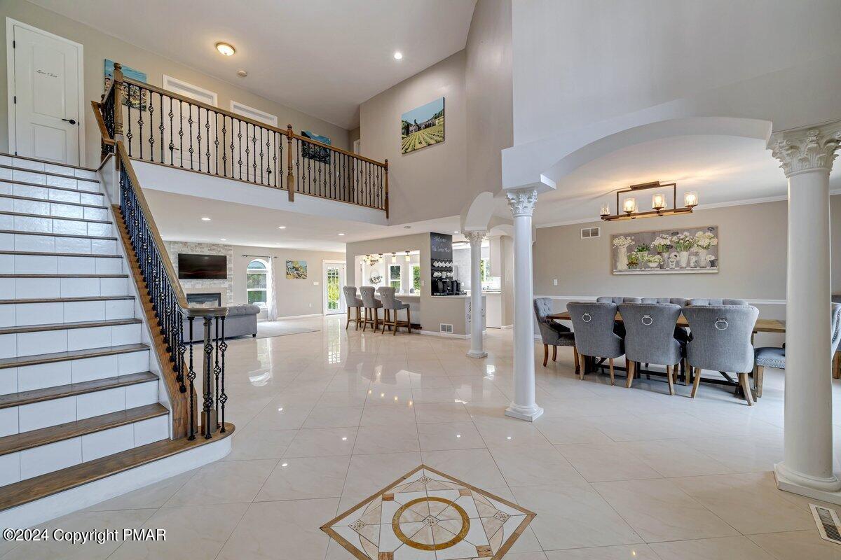 2175 Longview Drive Bushkill, PA 18324 - Photo 5 of 50 a lobby with furniture and stairs