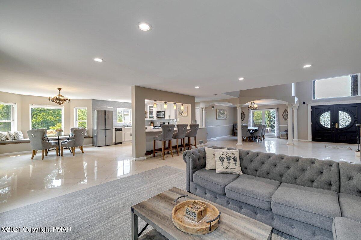 2175 Longview Drive Bushkill, PA 18324 - Photo 7 of 50 a living room with furniture and a wooden floor