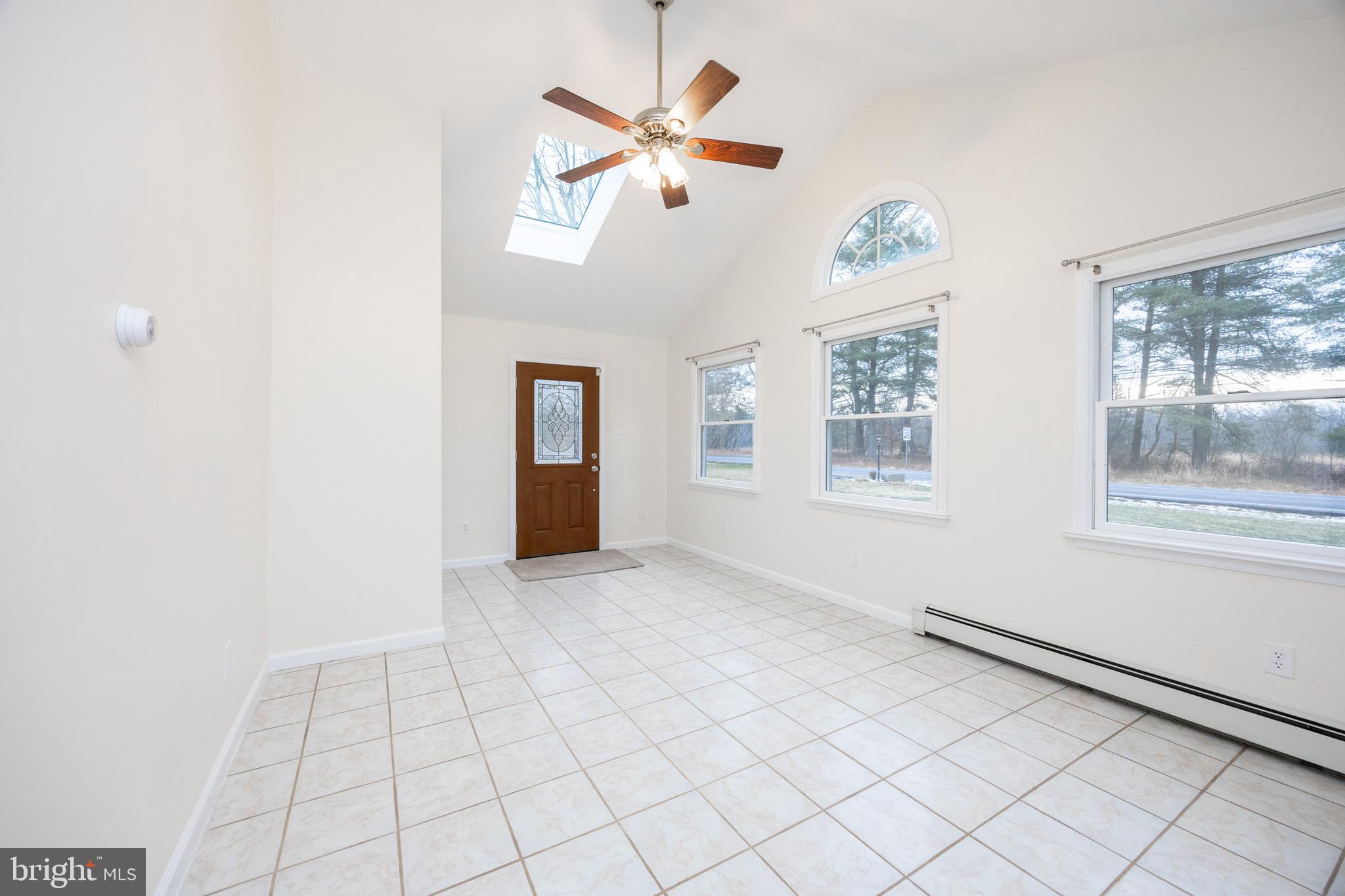 5816 Upper Ridge Road Pennsburg, PA 18073 - Photo 12 of 71 a view of an empty room with a window