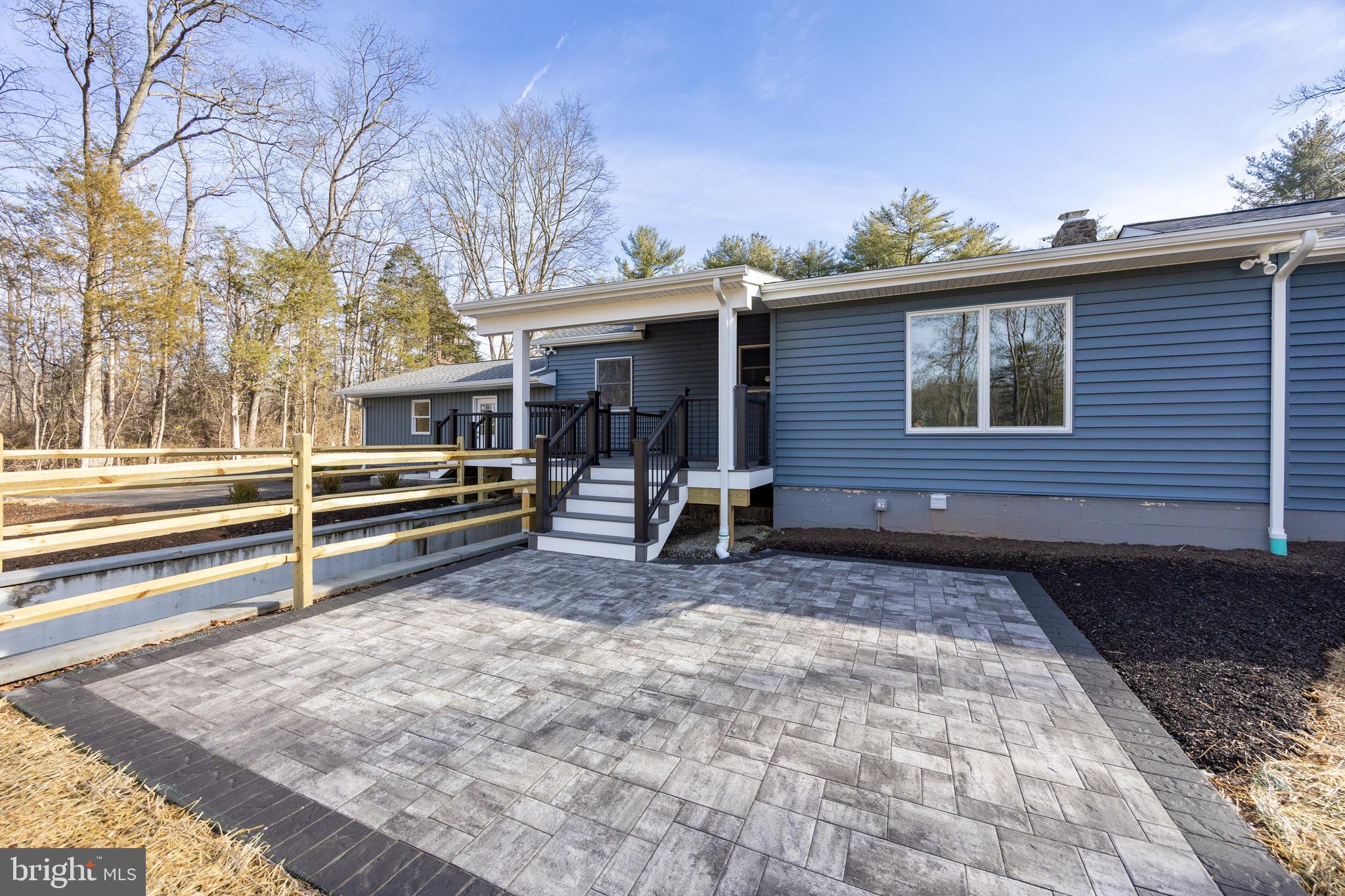 5816 Upper Ridge Road Pennsburg, PA 18073 - Photo 34 of 71 a view of backyard with deck and seating space