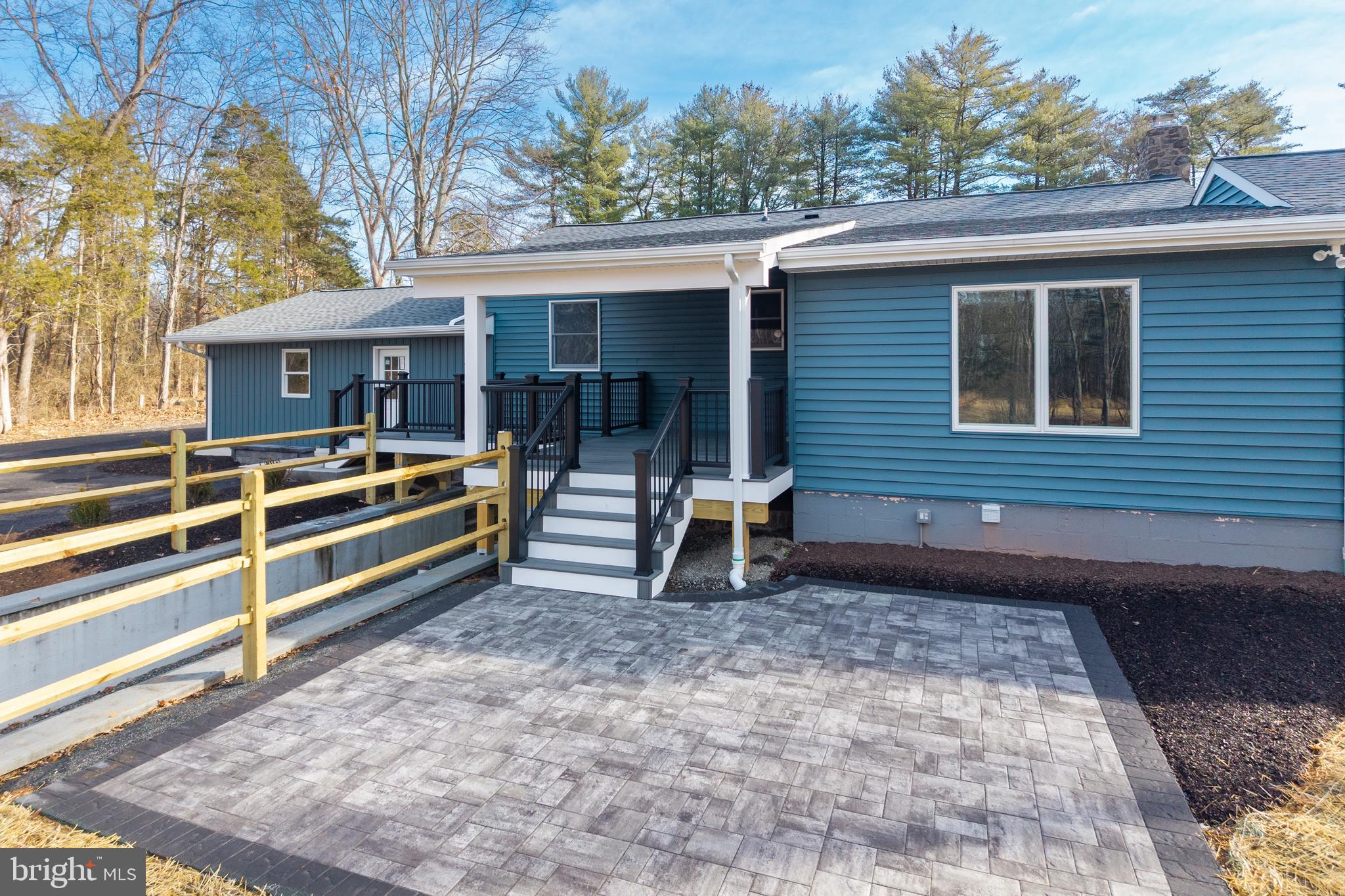 5816 Upper Ridge Road Pennsburg, PA 18073 - Photo 35 of 71 a view of house with backyard and trees