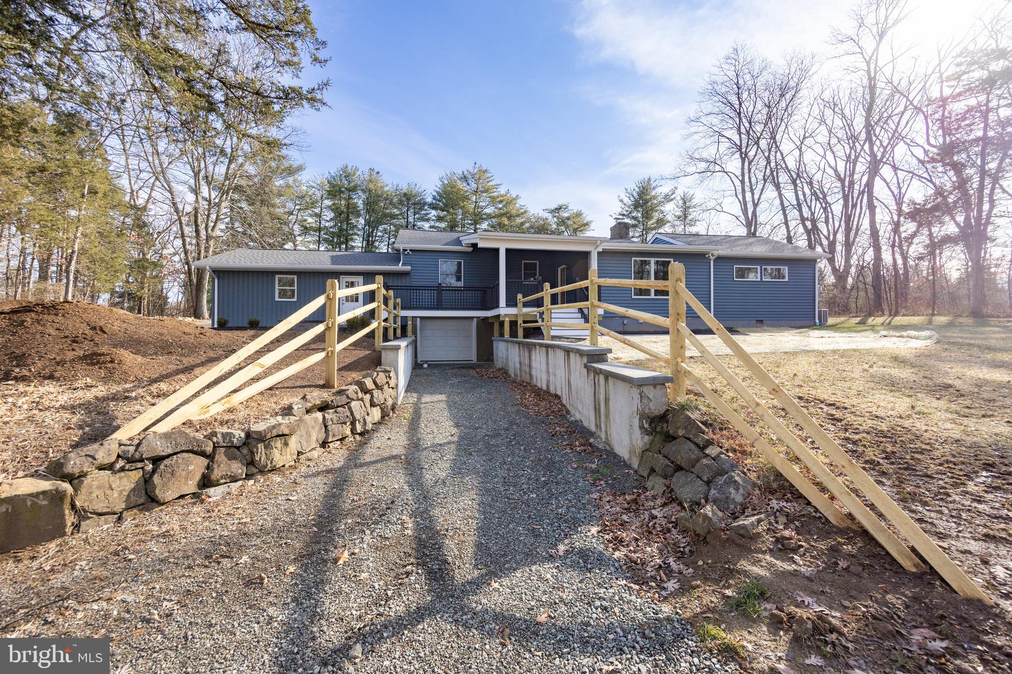 5816 Upper Ridge Road Pennsburg, PA 18073 - Photo 37 of 71 a view of a house with a yard covered in snow