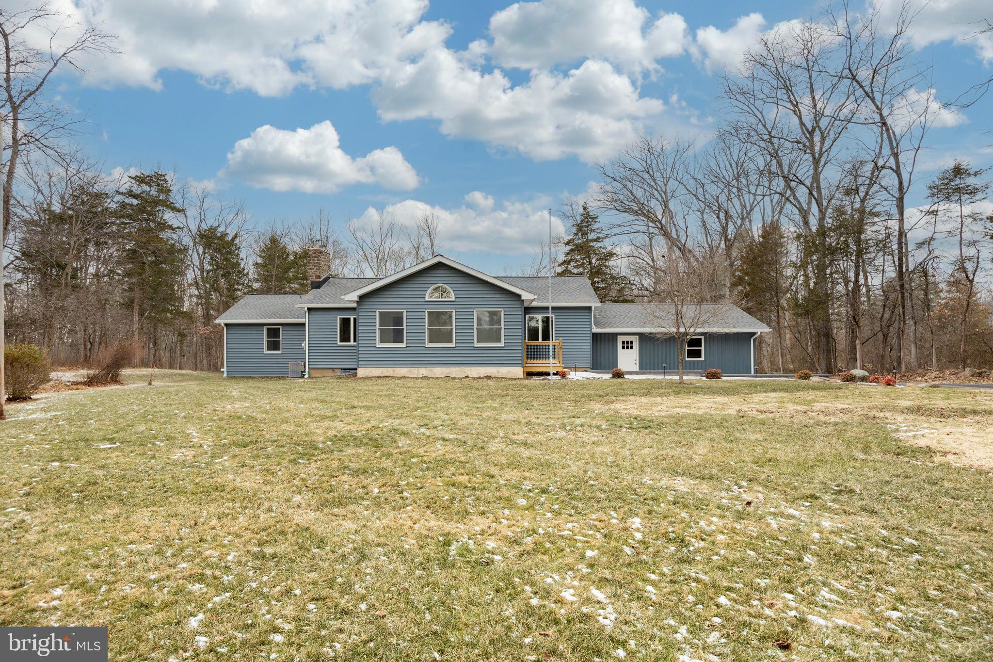 5816 Upper Ridge Road Pennsburg, PA 18073 - Photo 39 of 71 a front view of a house with a yard