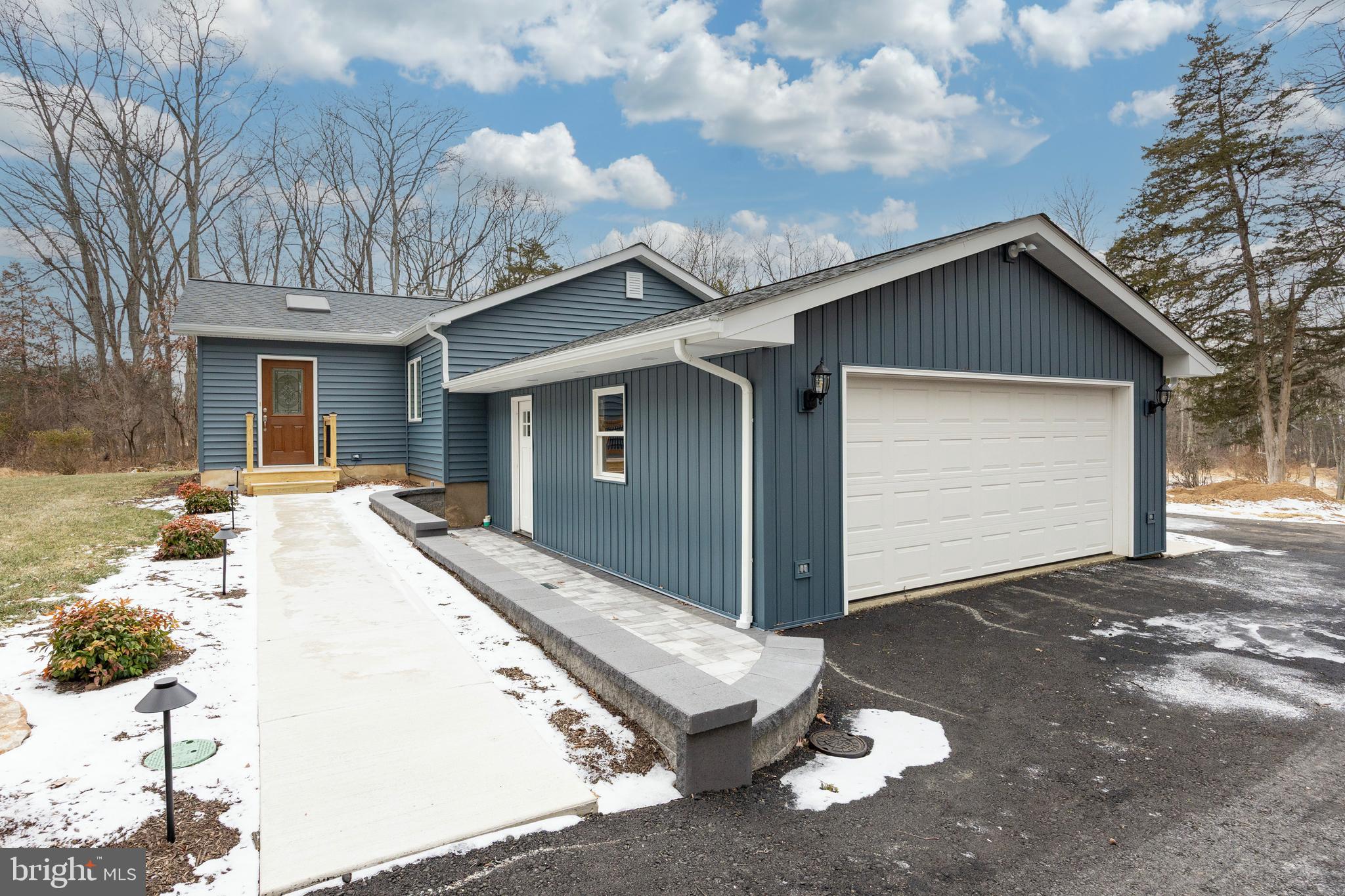 5816 Upper Ridge Road Pennsburg, PA 18073 - Photo 42 of 71 a view of a house with a patio