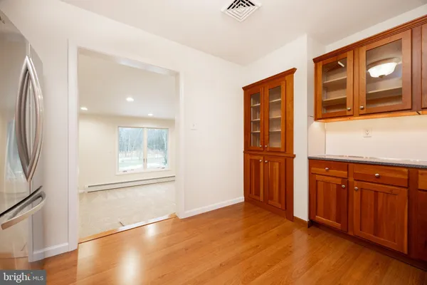 a view of a refrigerator and window