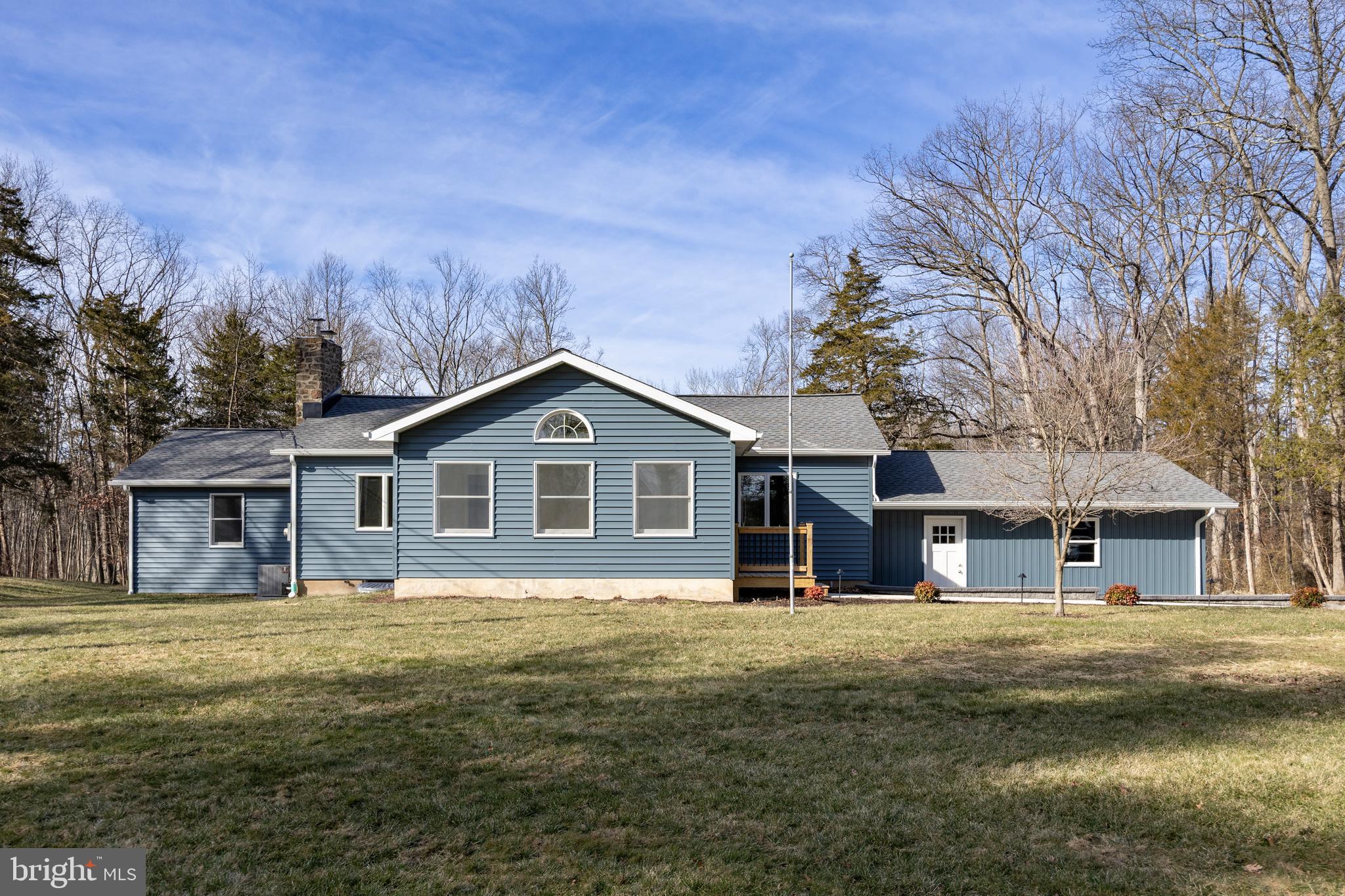 5816 Upper Ridge Road Pennsburg, PA 18073 - Photo 63 of 71 a front view of a house with a yard