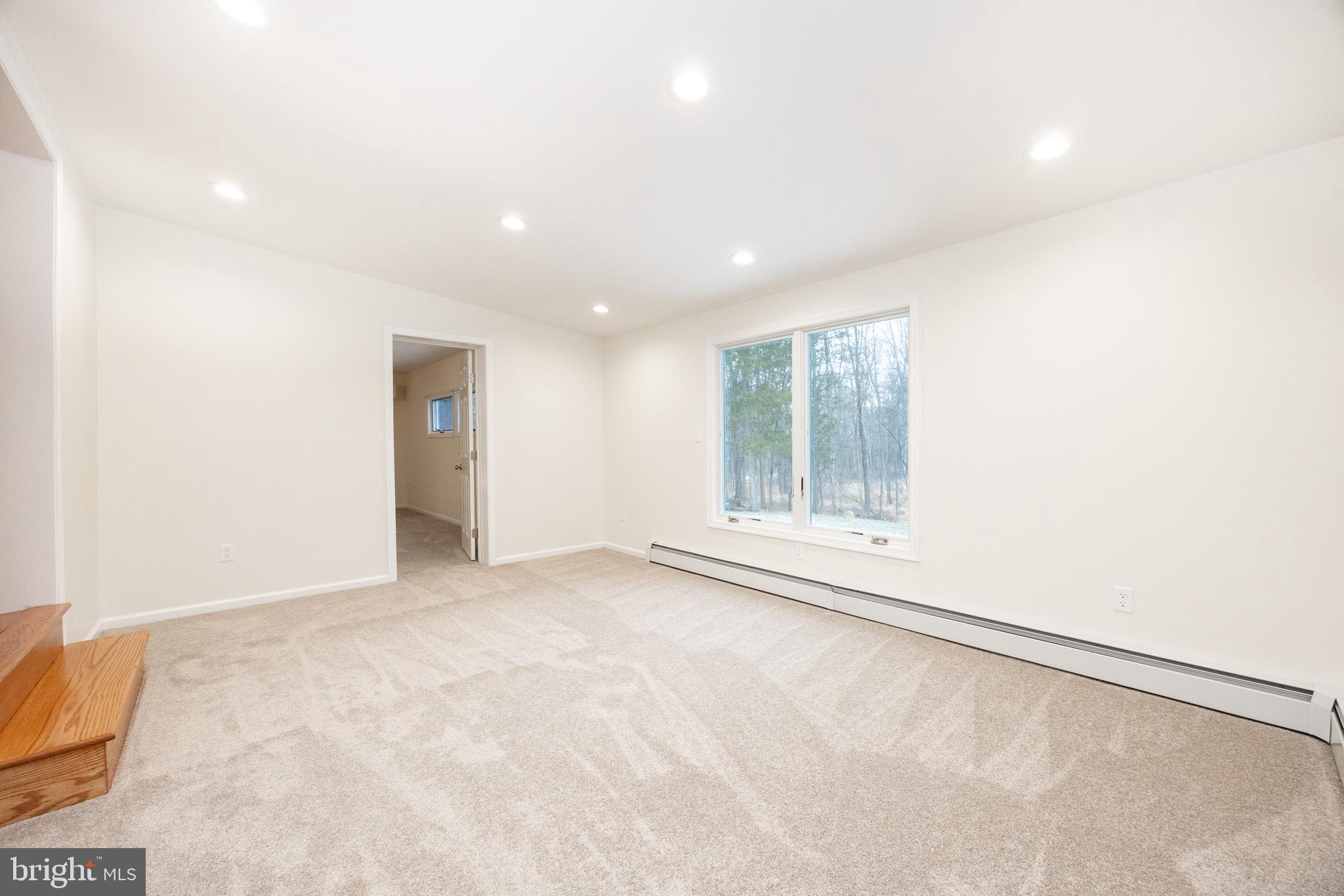 5816 Upper Ridge Road Pennsburg, PA 18073 - Photo 8 of 71 an empty room with windows