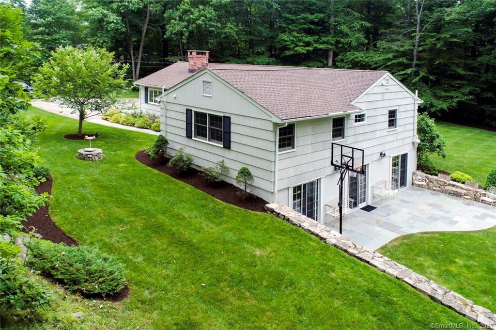 49 Bayberry Hill Road Ridgefield, CT 06877 - Photo 1 of 1 a aerial view of a white house sitting in big yard with large trees