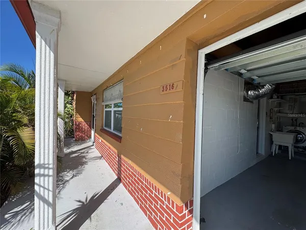 a kitchen with granite countertop stainless steel appliances and wooden cabinets