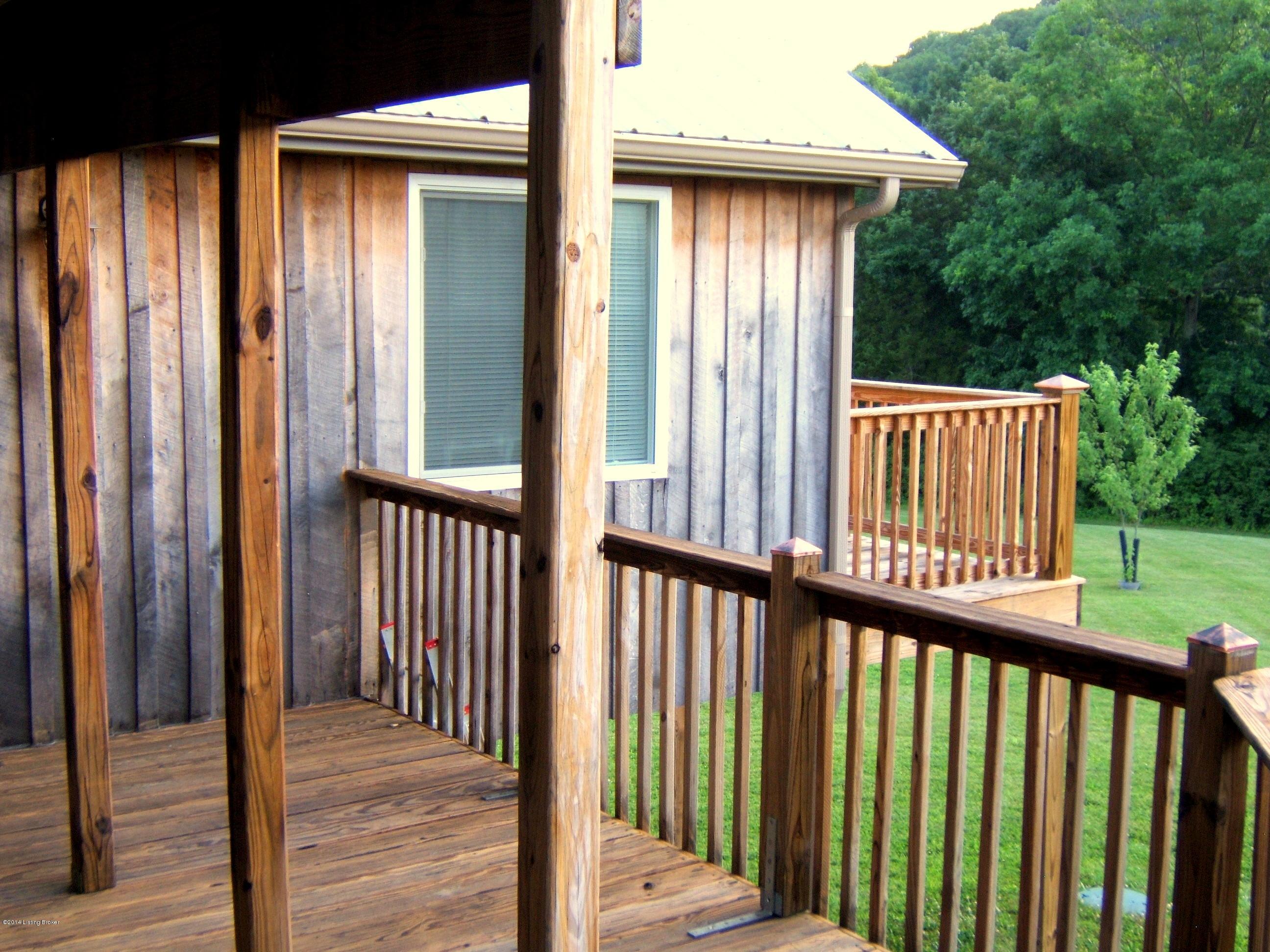 651 Day Road Taylorsville, KY 40071 - Photo 29 of 41 You can seen the bedroom deck on the back of the house.