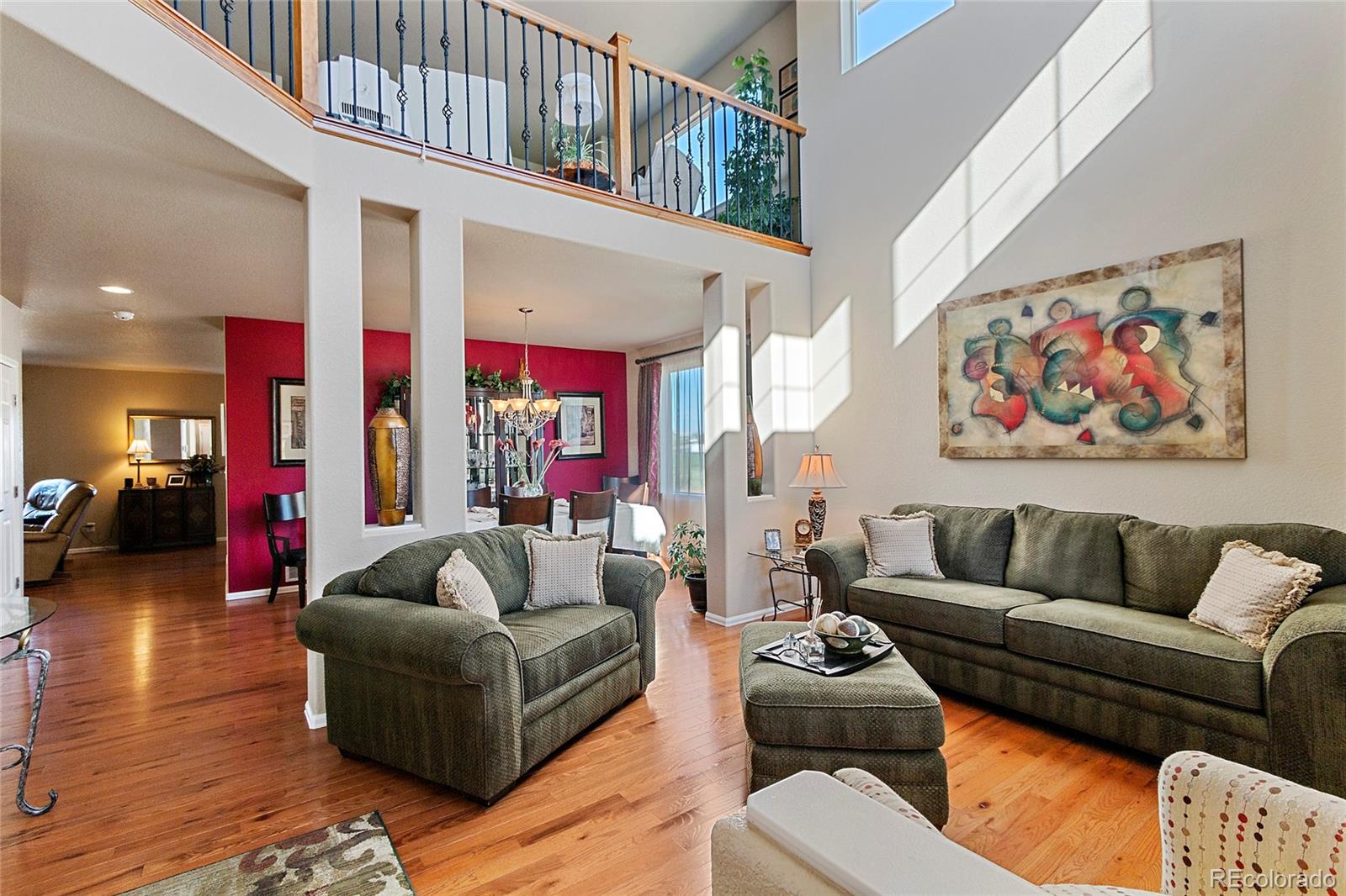8151 Raspberry Drive Frederick, CO 80504 - Photo 2 of 35 a living room with furniture and a couch