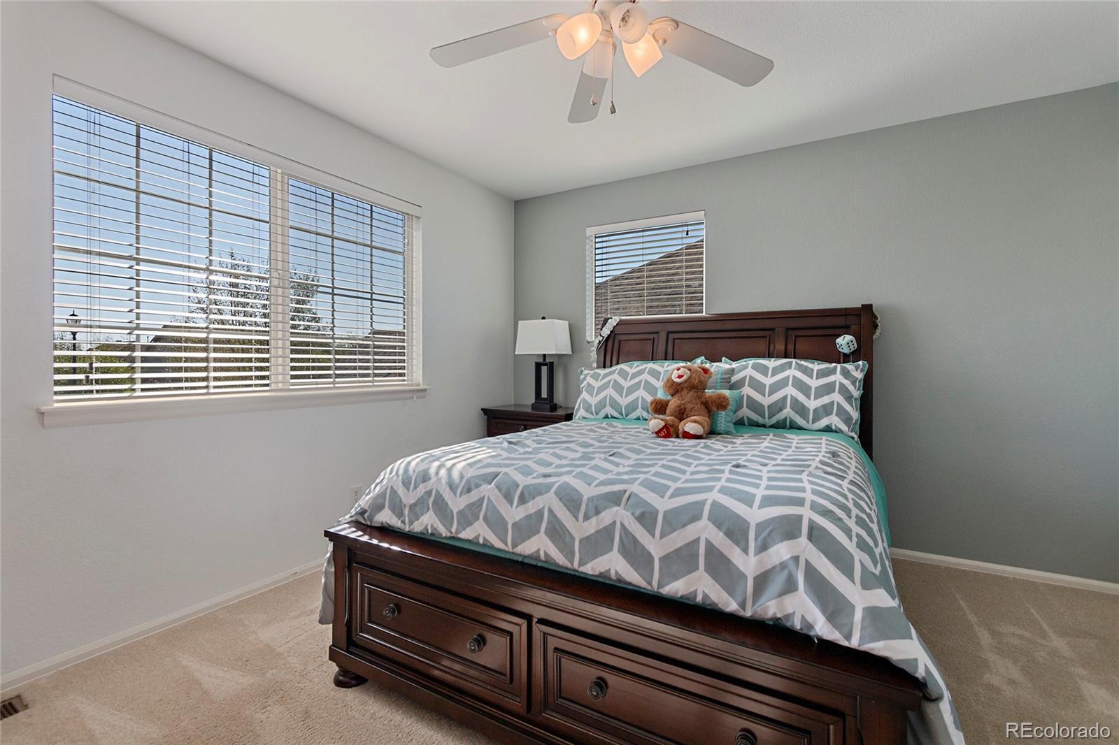 8151 Raspberry Drive Frederick, CO 80504 - Photo 26 of 35 a bedroom with a bed and a window