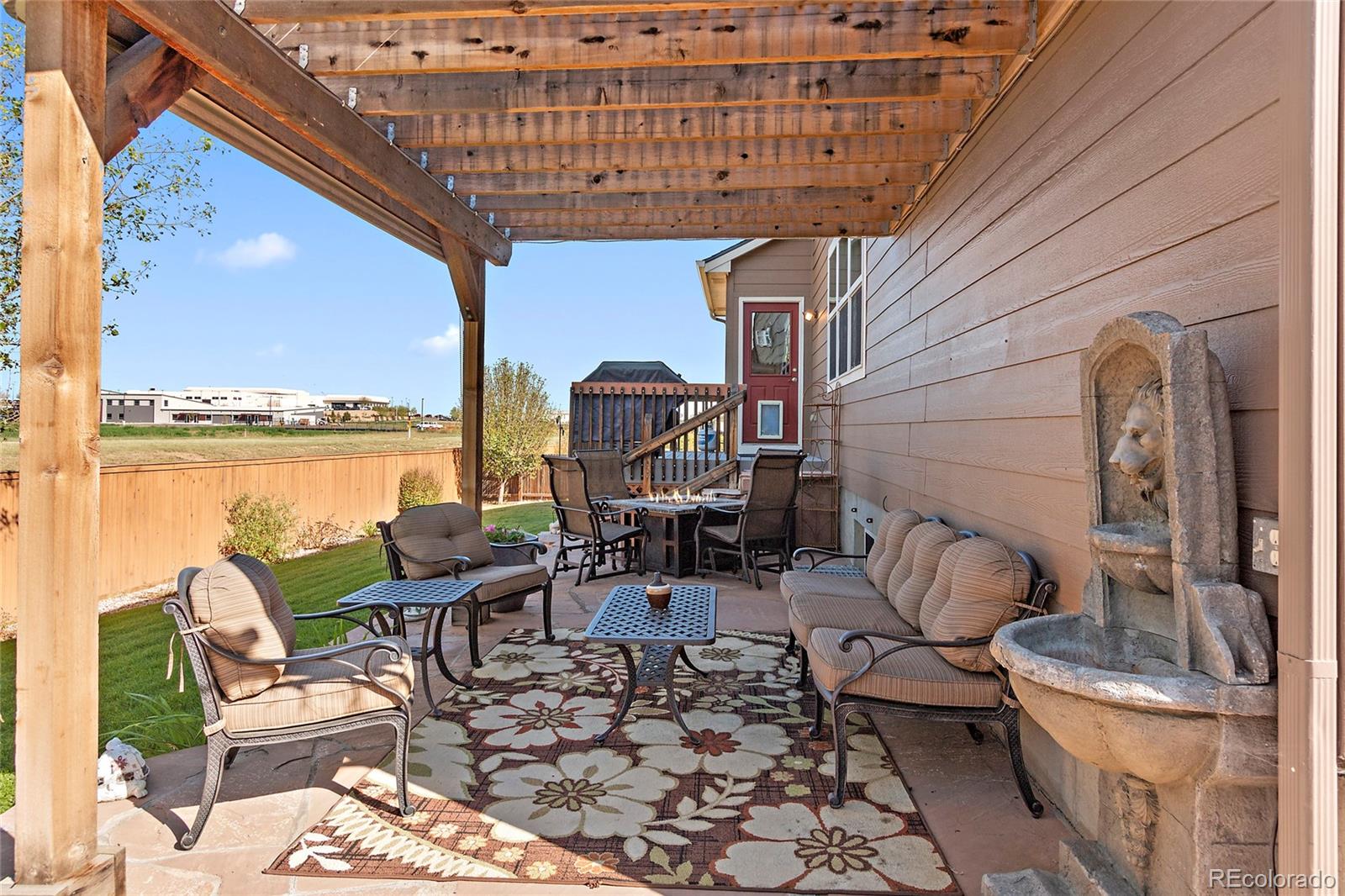 8151 Raspberry Drive Frederick, CO 80504 - Photo 31 of 35 a view of balcony with chairs and outdoor seating