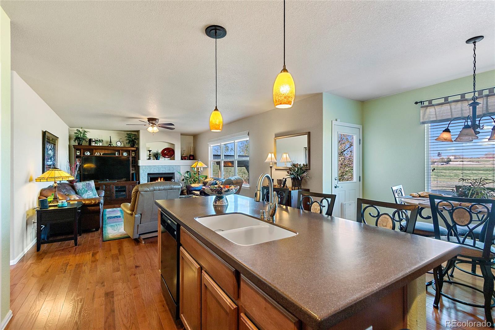 8151 Raspberry Drive Frederick, CO 80504 - Photo 9 of 35 a view of kitchen and dining room