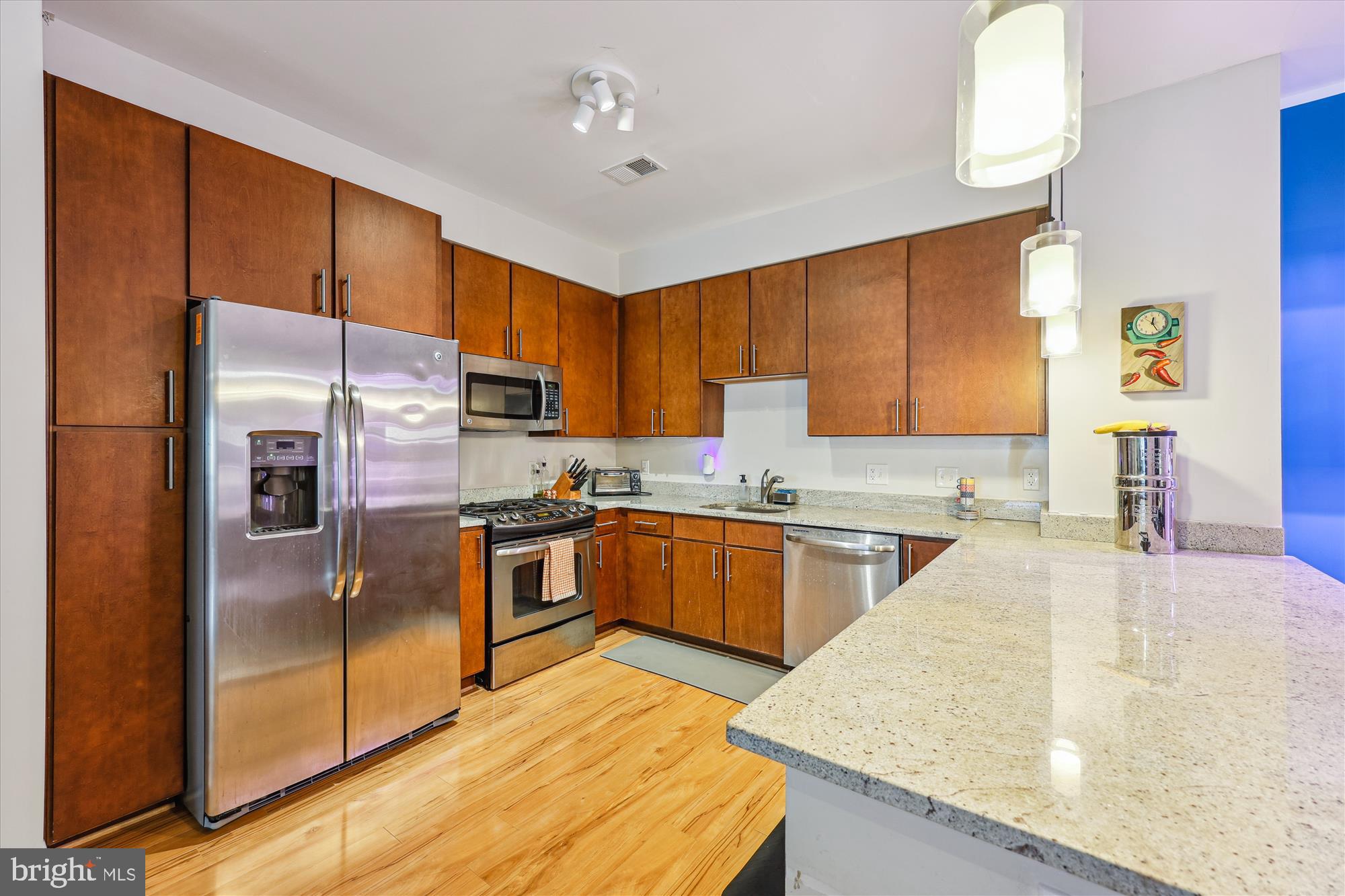 8005 13th Street, Unit 411 Silver Spring, MD 20910 - Photo 17 of 65 2nd view of the cooking area of kitchen.